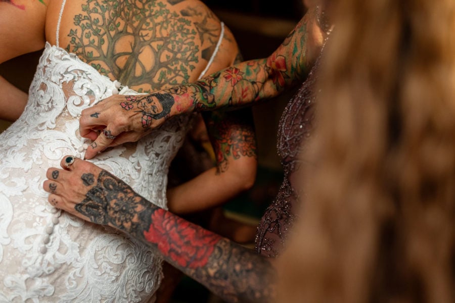 buttoning up wedding dress tattoos
