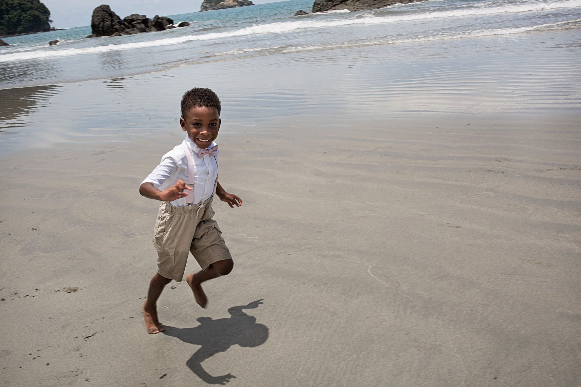 kid running on beach