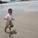 kid running on beach