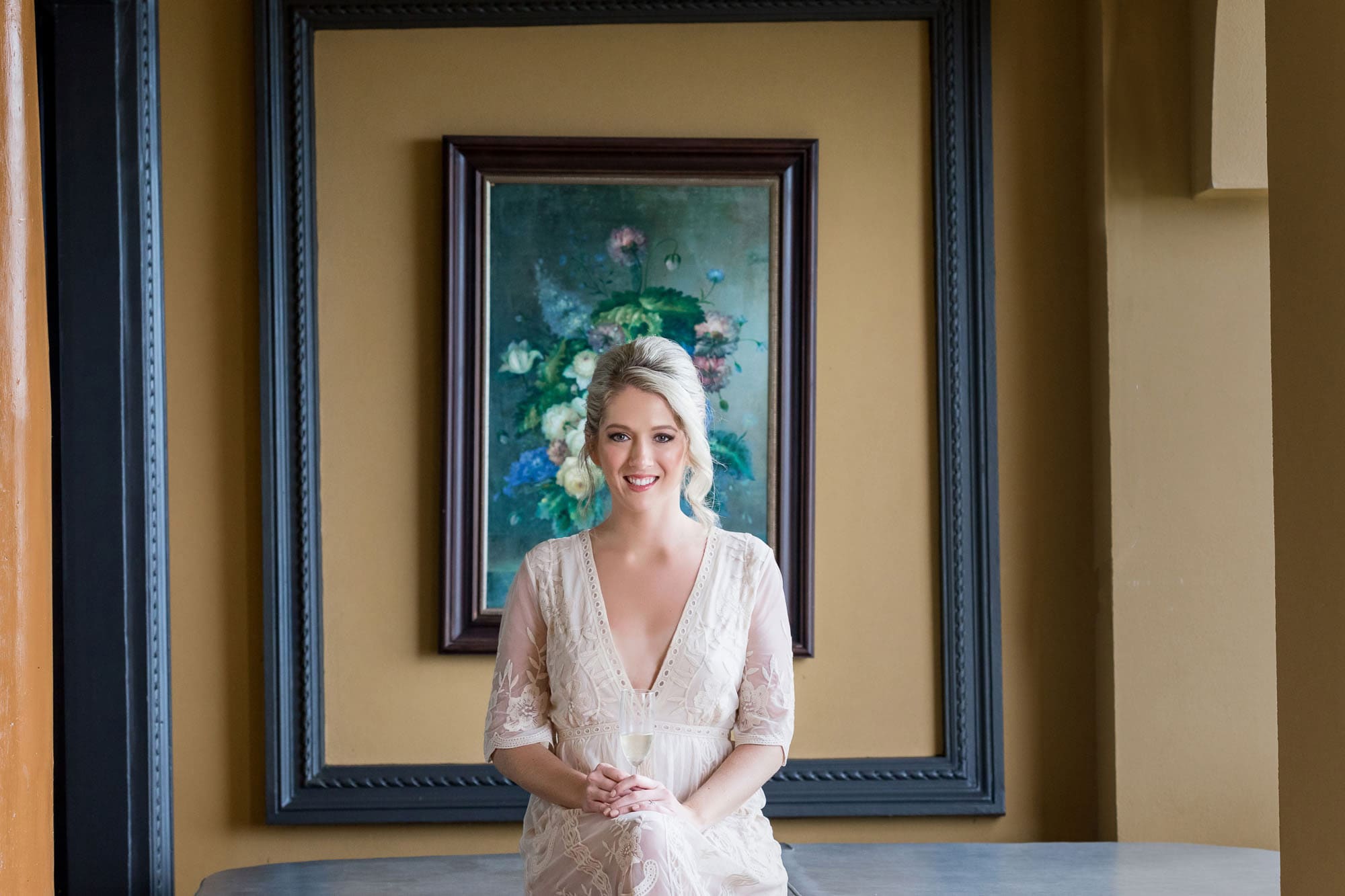 The bride framed by a frame within a frame