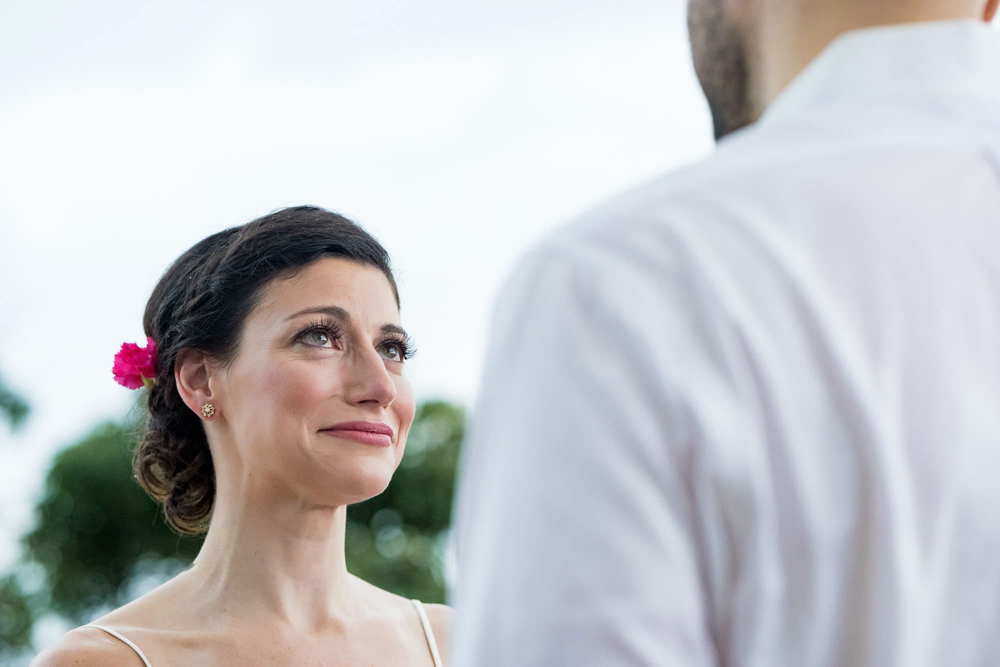 A poignant moment registers on the bride's face during the costa rica elopement ceremony