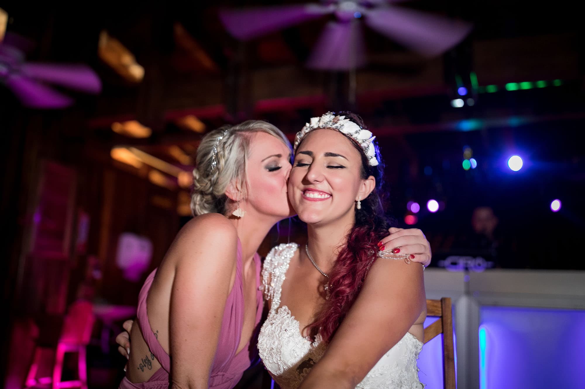 Love blooms as they have fun at the reception