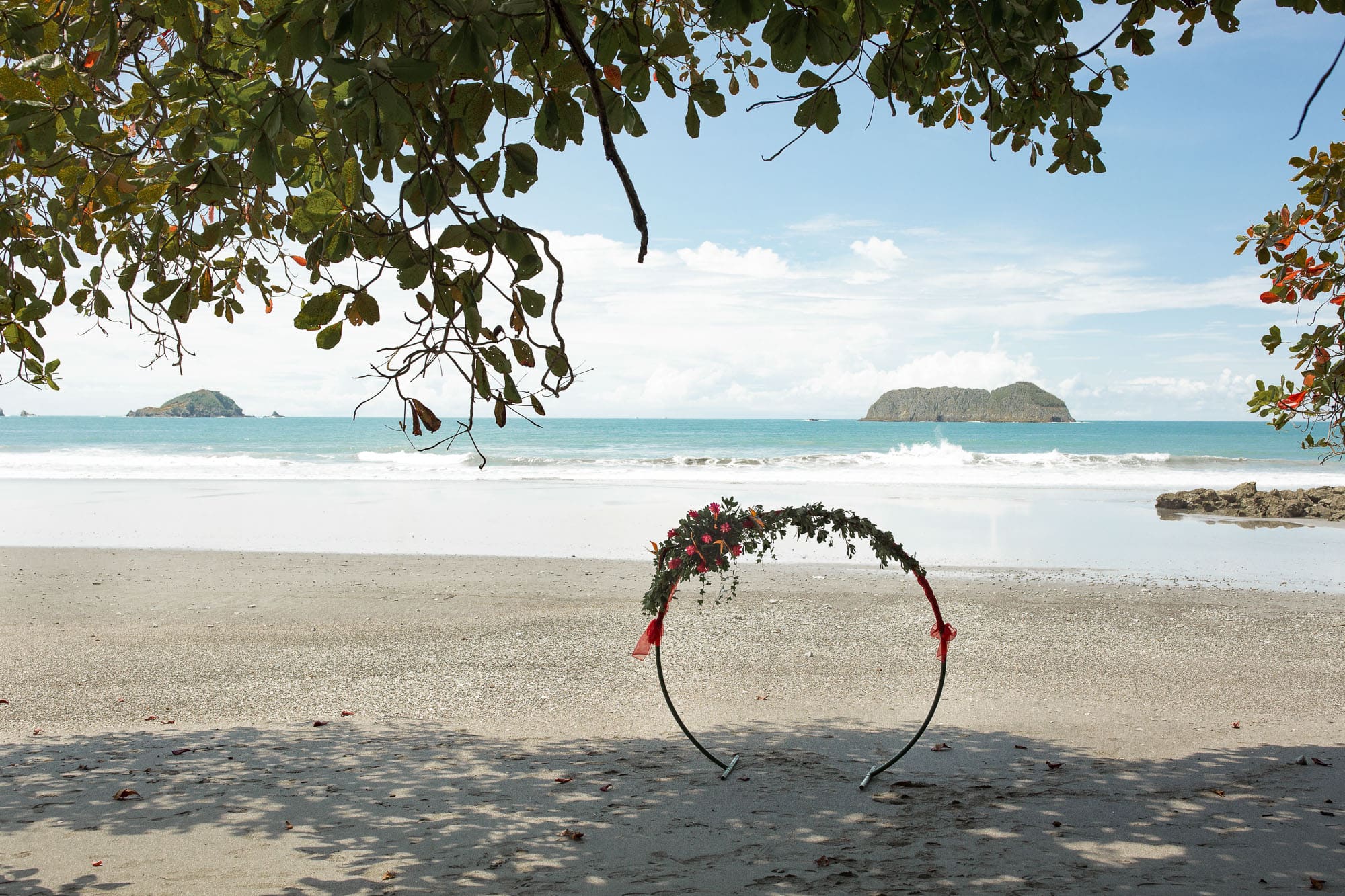 The arbor on the beach for the simple ceremony