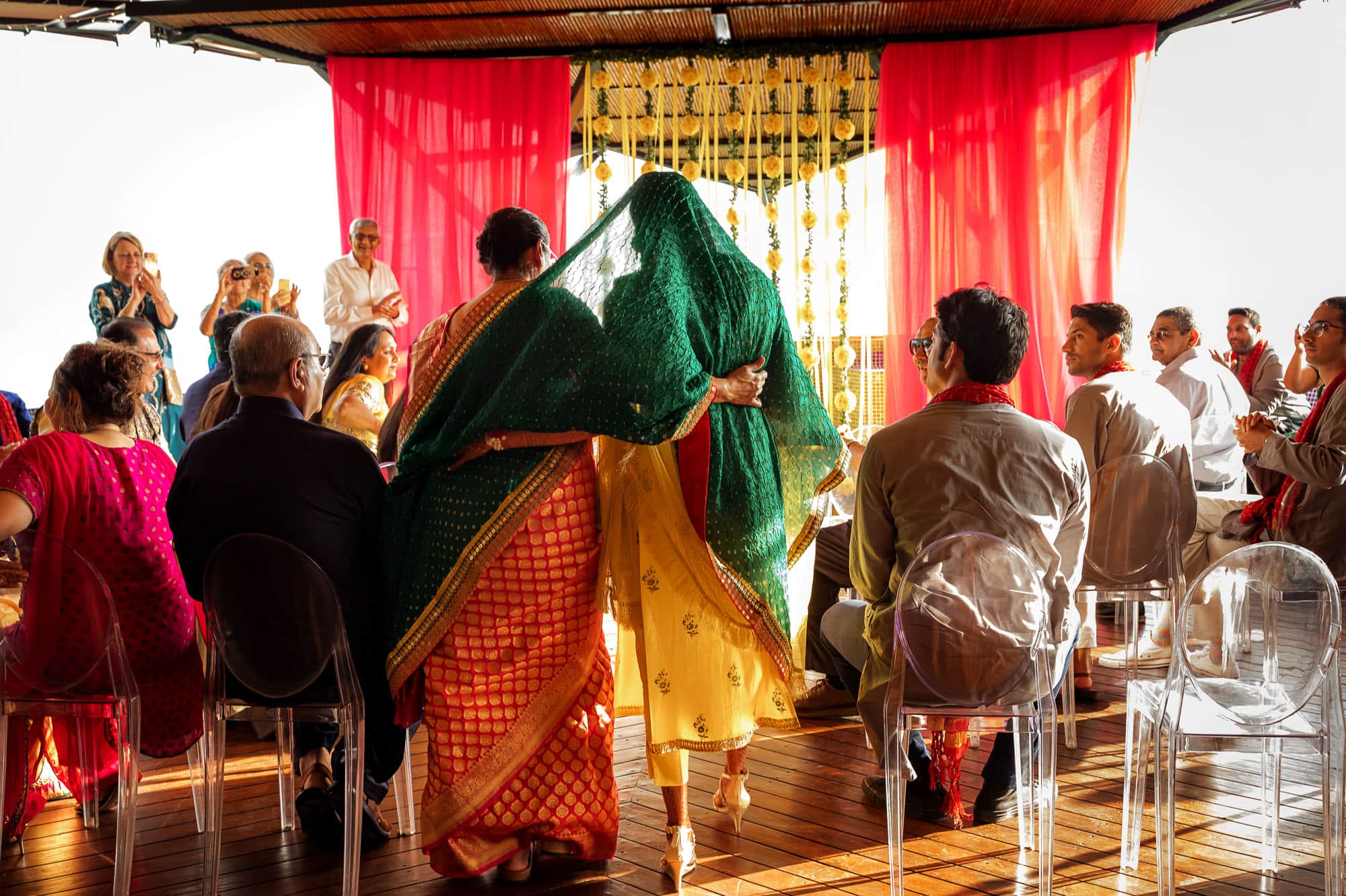 Escorting the bride in for the Pithi ceremony