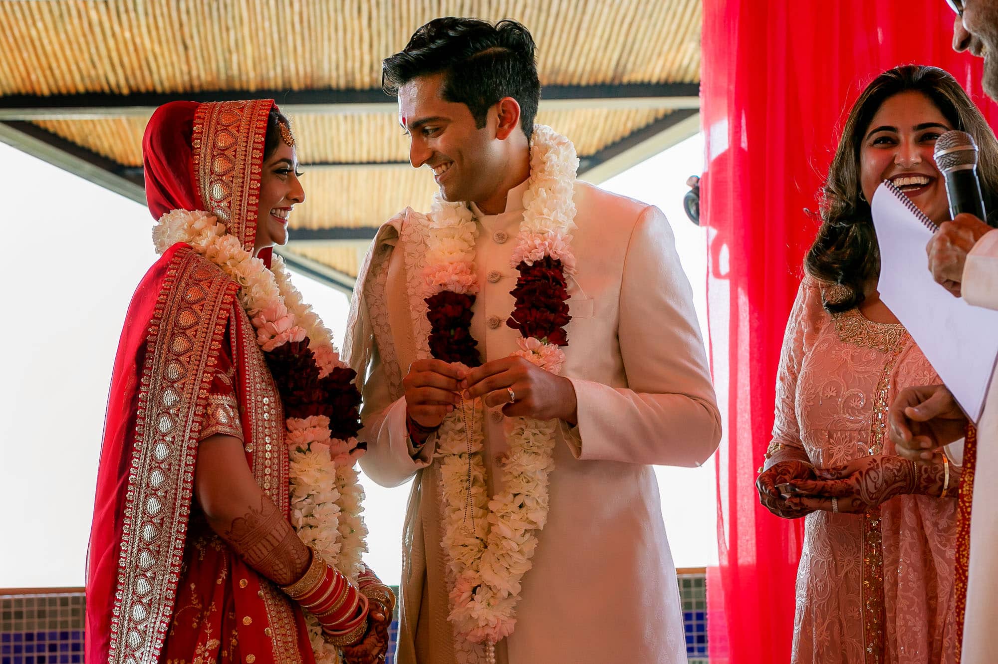 Exchanging rings at the traditional Hindu Muslim wedding ceremony