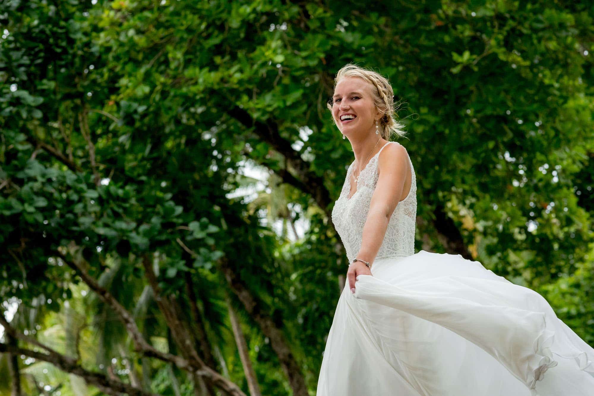 Bridal portraits after the church wedding ceremony on the beach