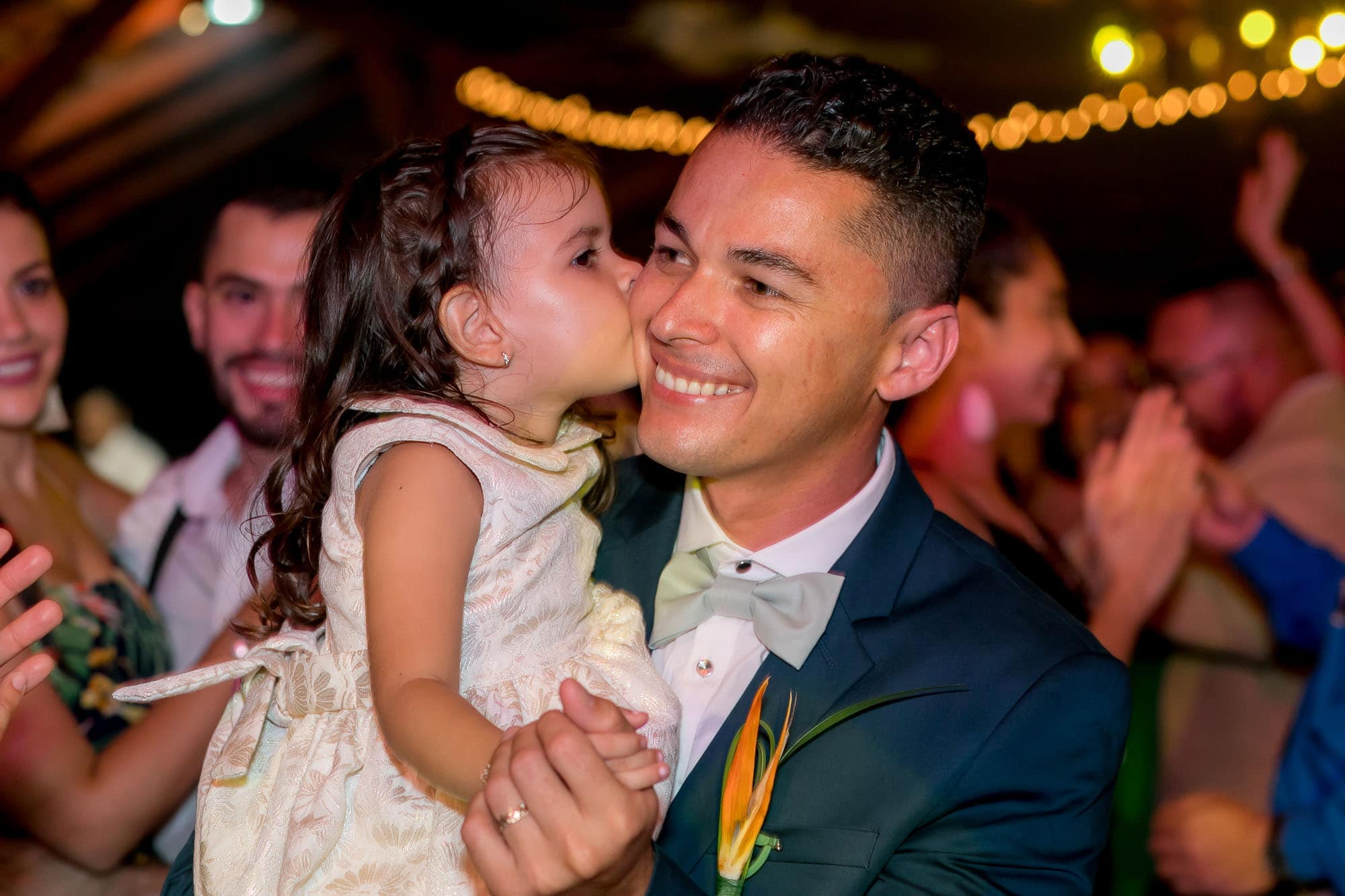 The groom gets a kiss from a little admirer!