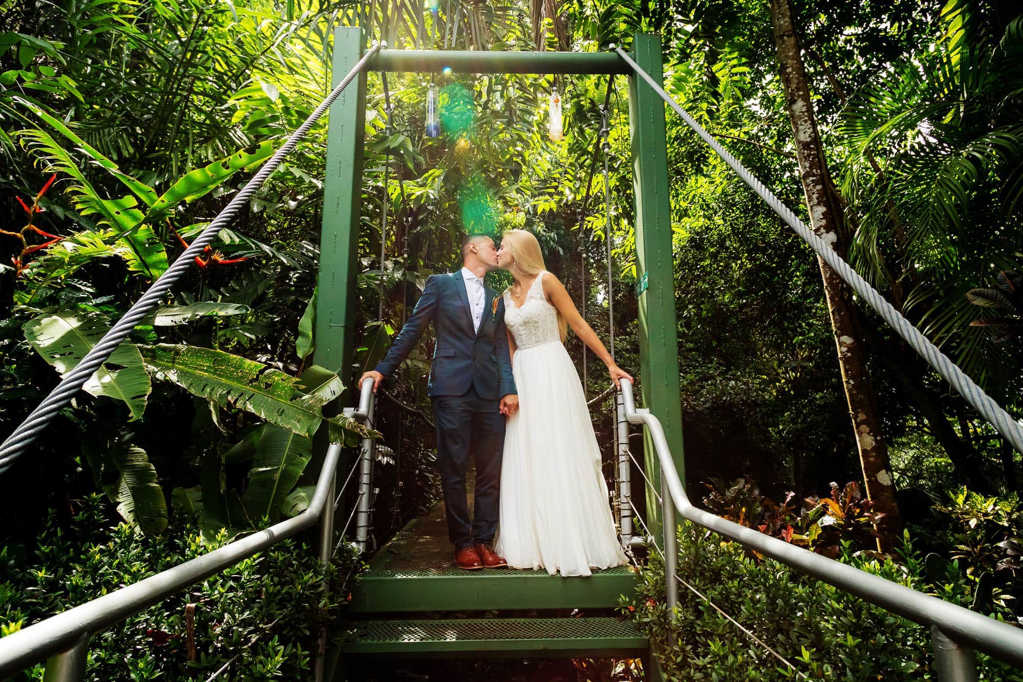 Sharing a kiss on the suspension bridge at Costa Verde