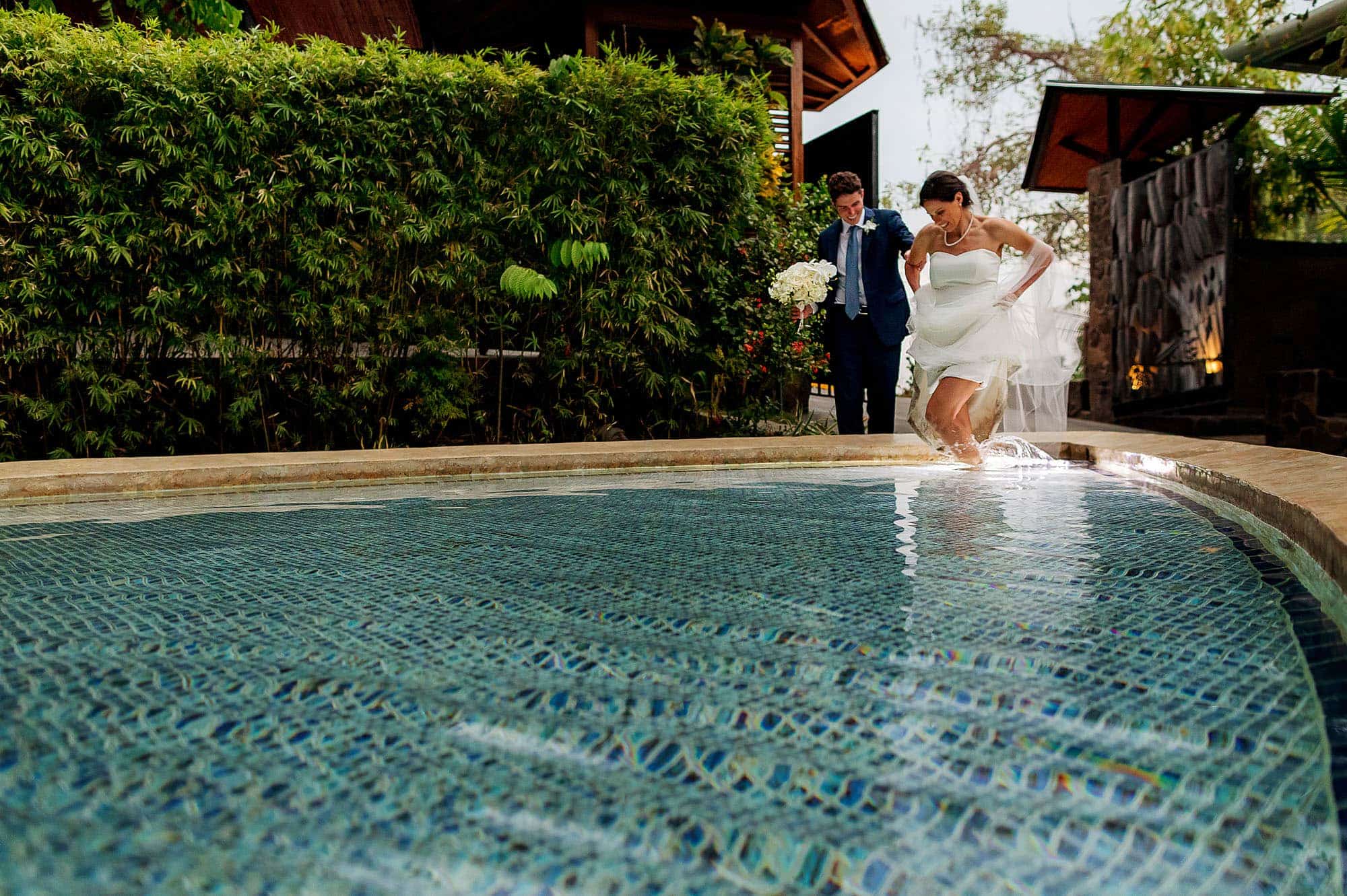 wedding couple in pool