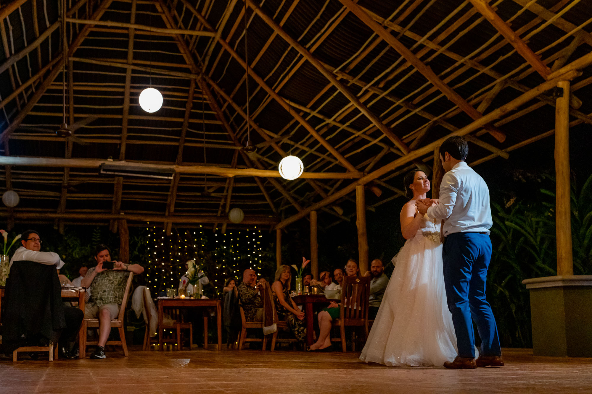 bride and groom on the dance floor at doce lunas