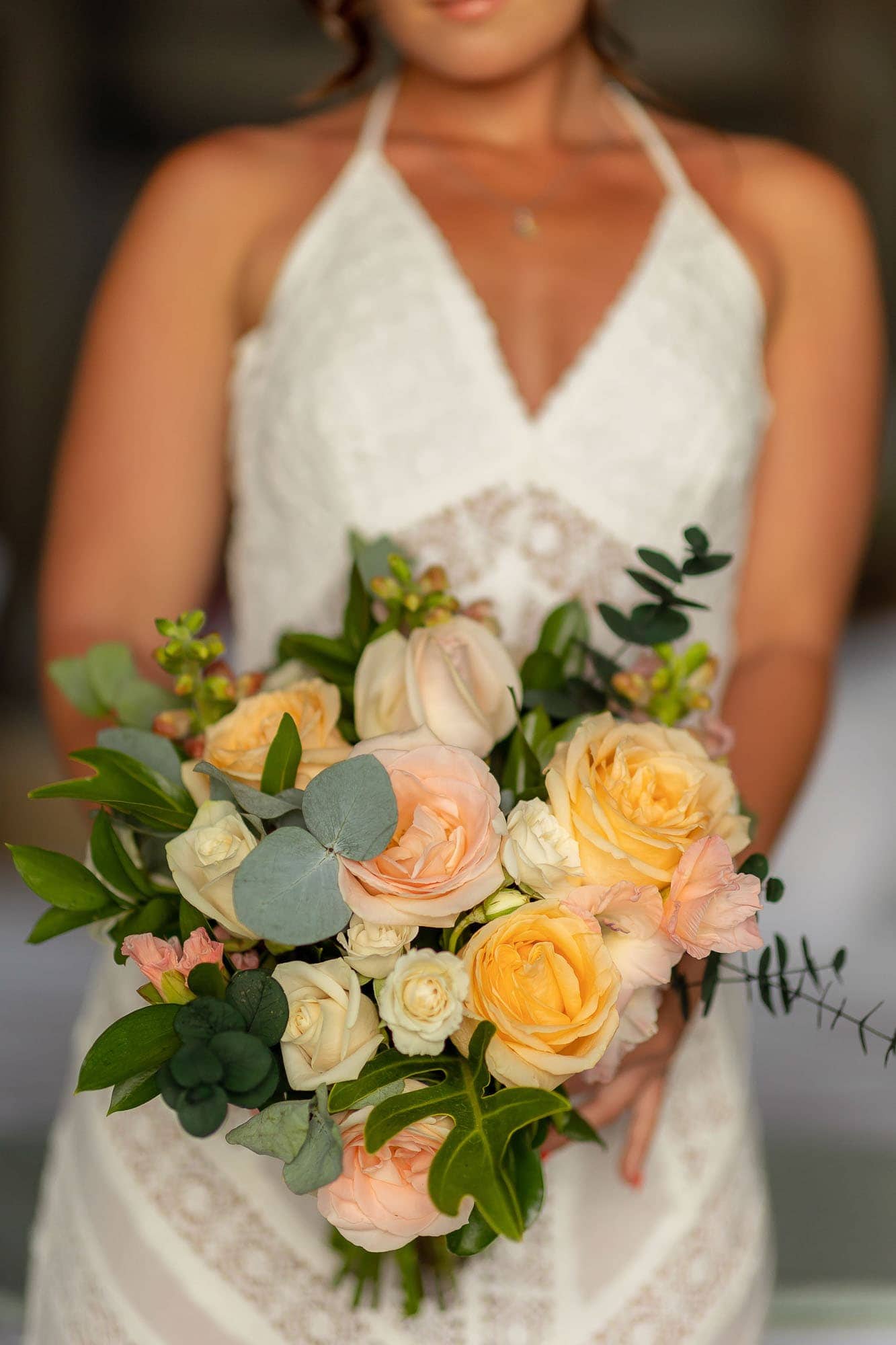 closeup of the bride and her bouquet for her surprise wedding