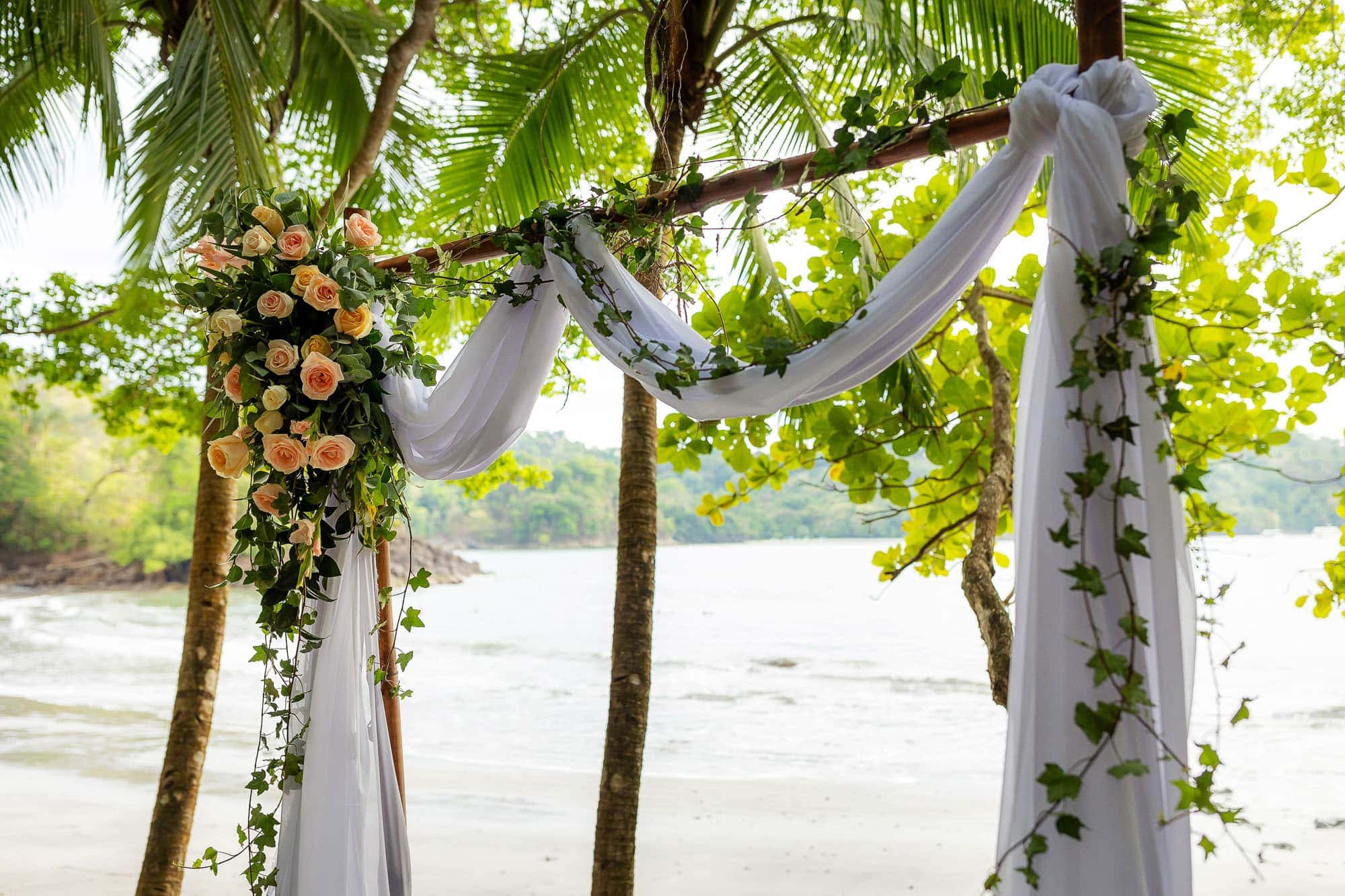 closeup of the arbor at the ceremony site on the beach