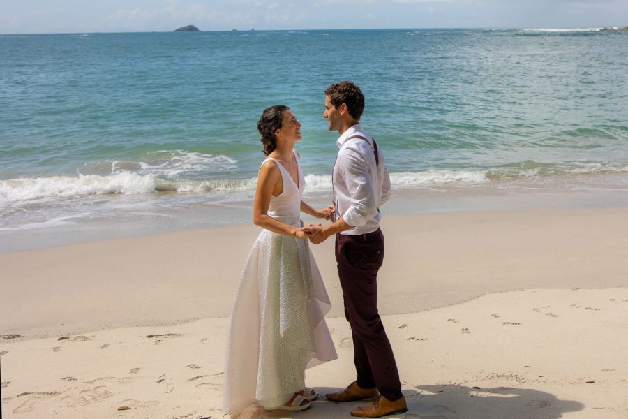 the bride and groom on manuel antonio beach