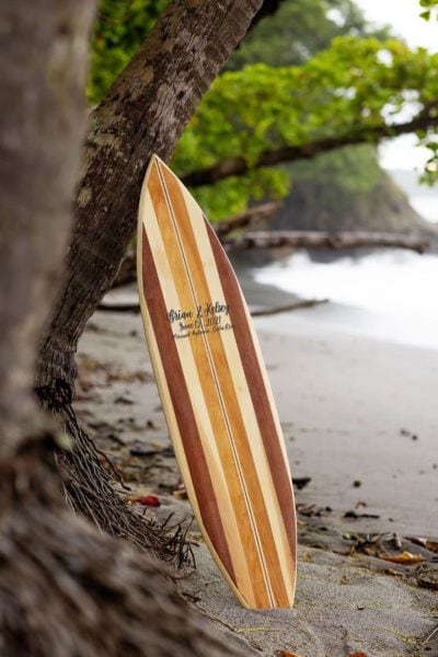 Surfboard sign for a beach wedding