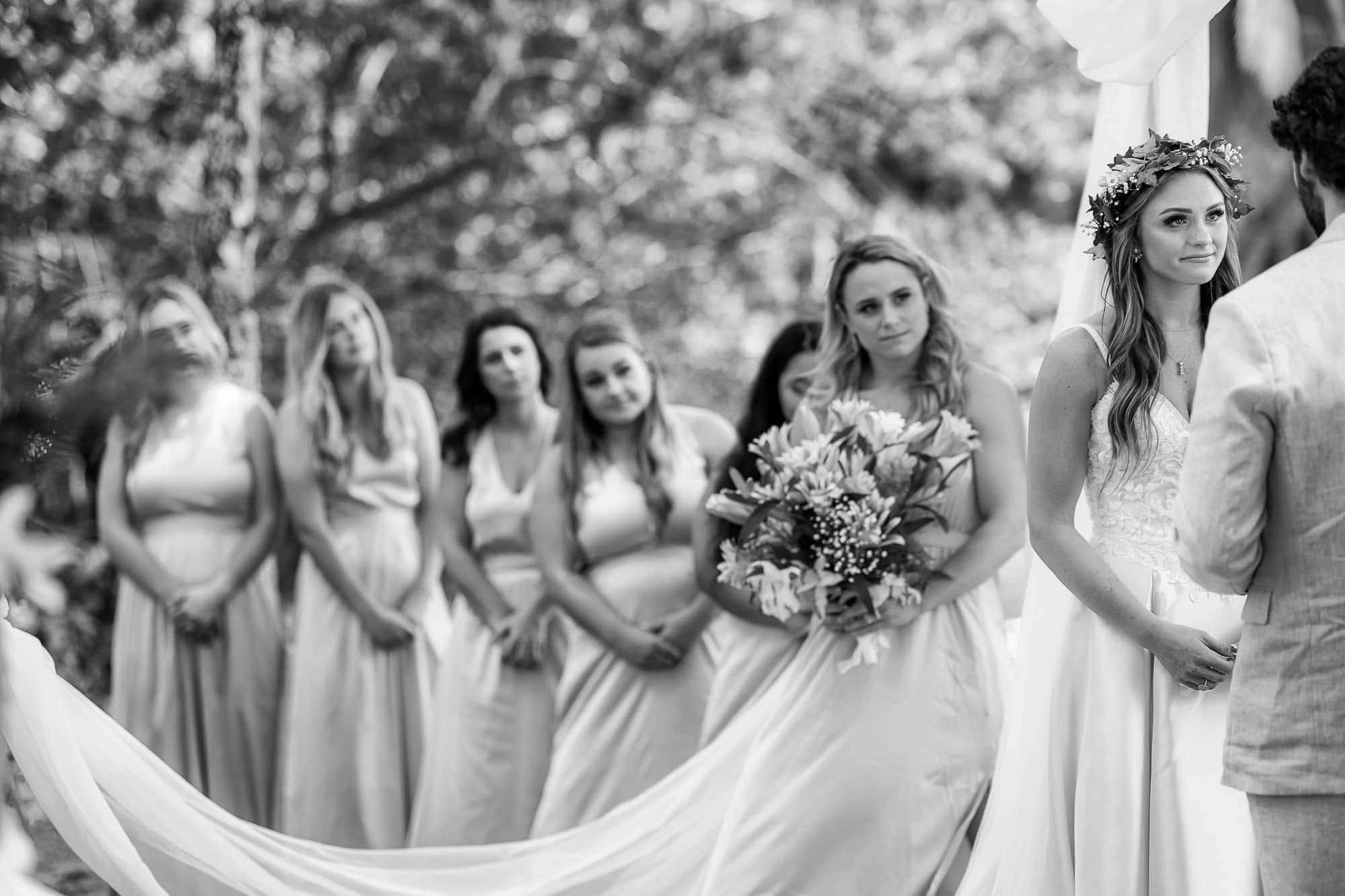 The bride and bridesmaids during the ceremony