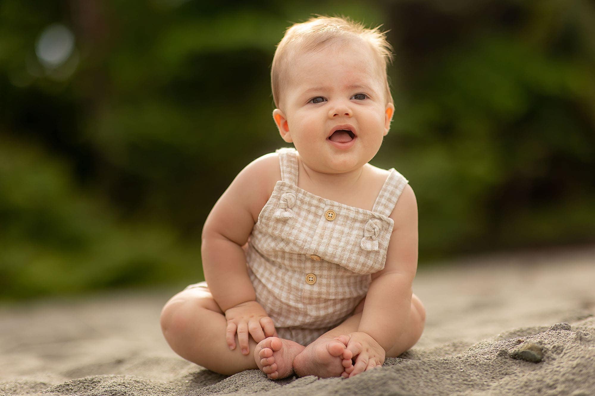 baby on beach at portrait session