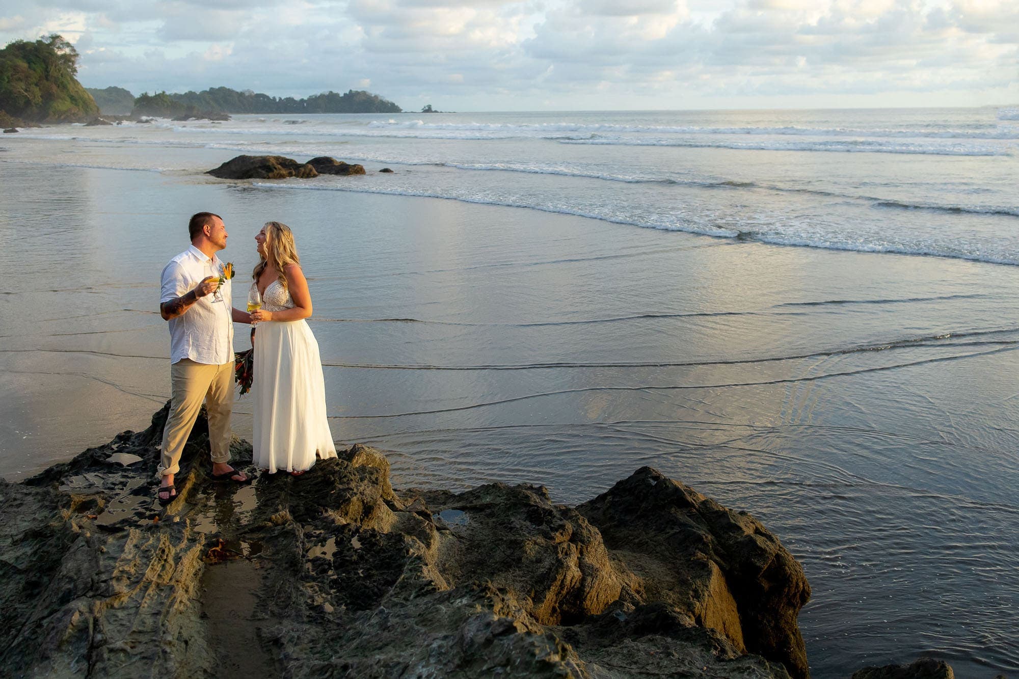 The bride and groom on the beach after their Dominical, Costa rica beach wedding