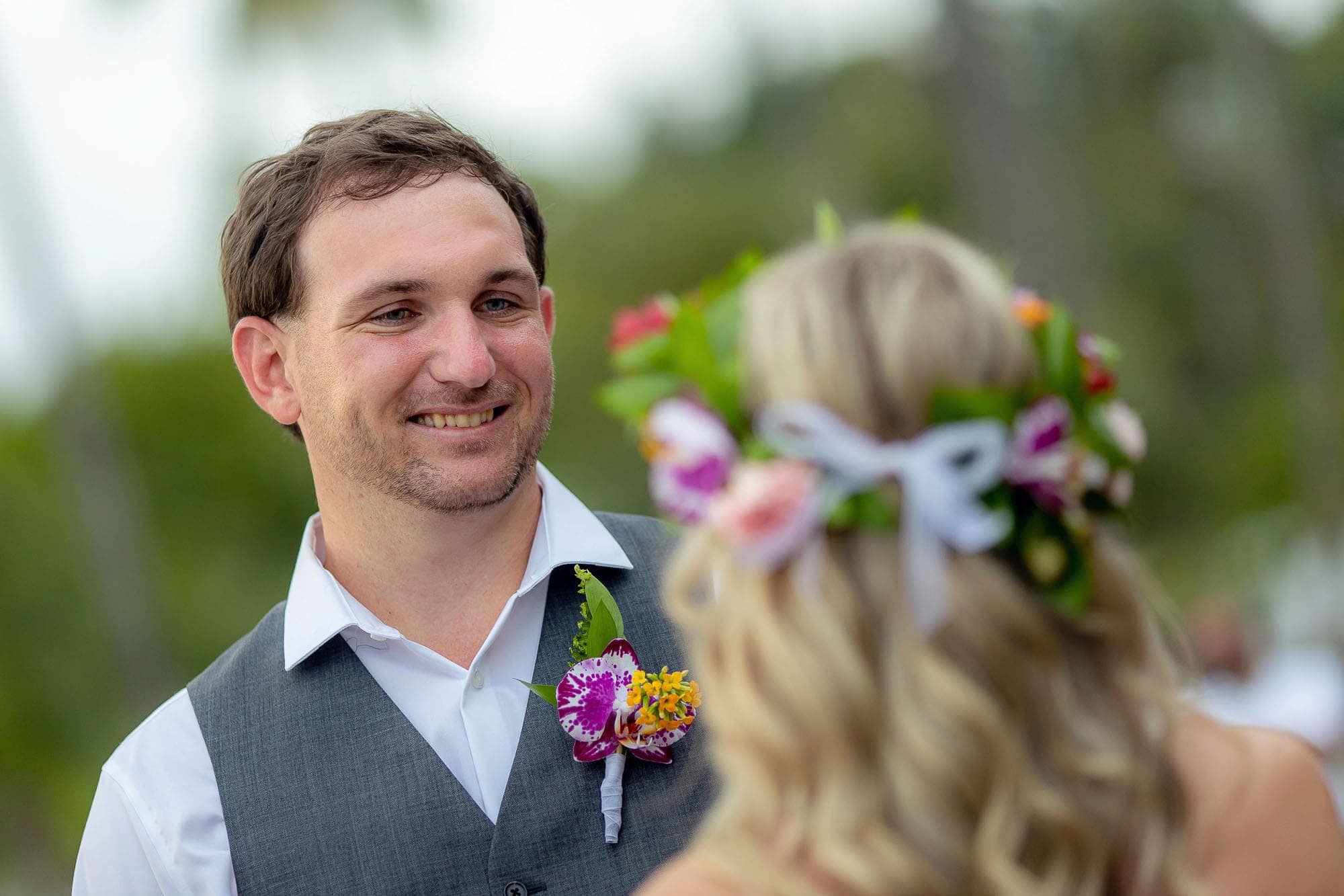Closeup on the groom during the ceremony