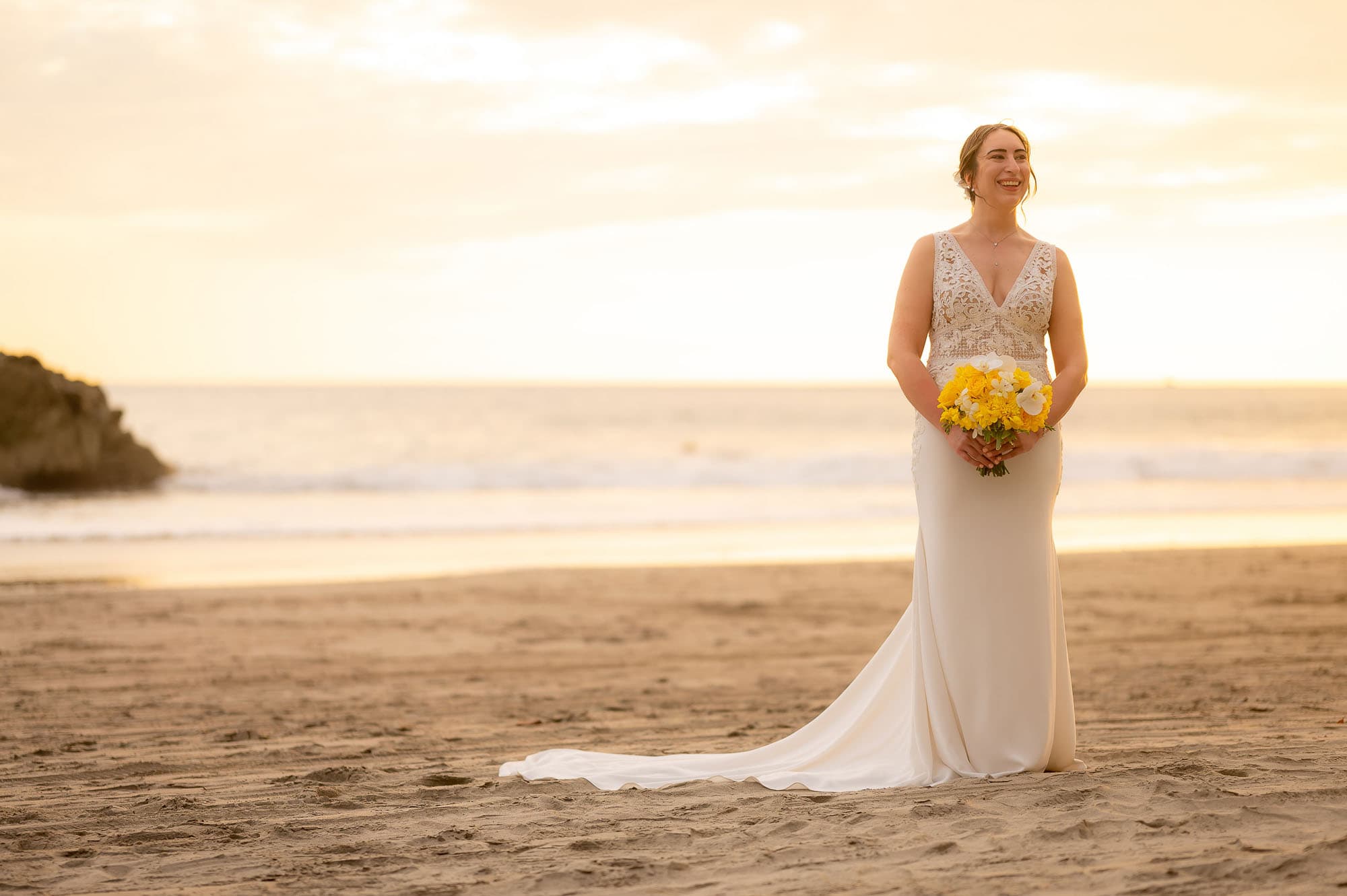 Spectacular shot of the bride at her wedding by the sea