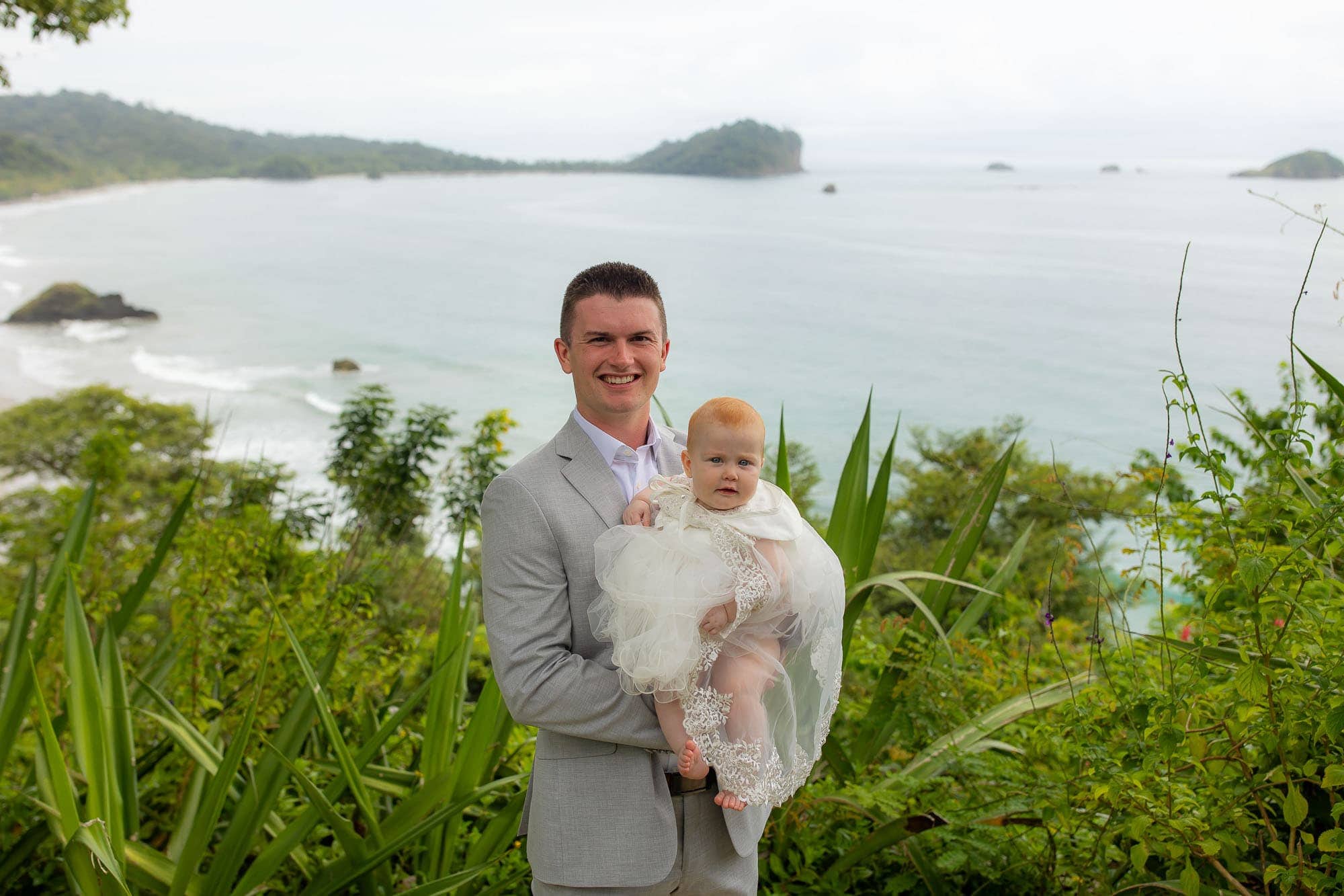 the groom and his baby at a costa rica wedding