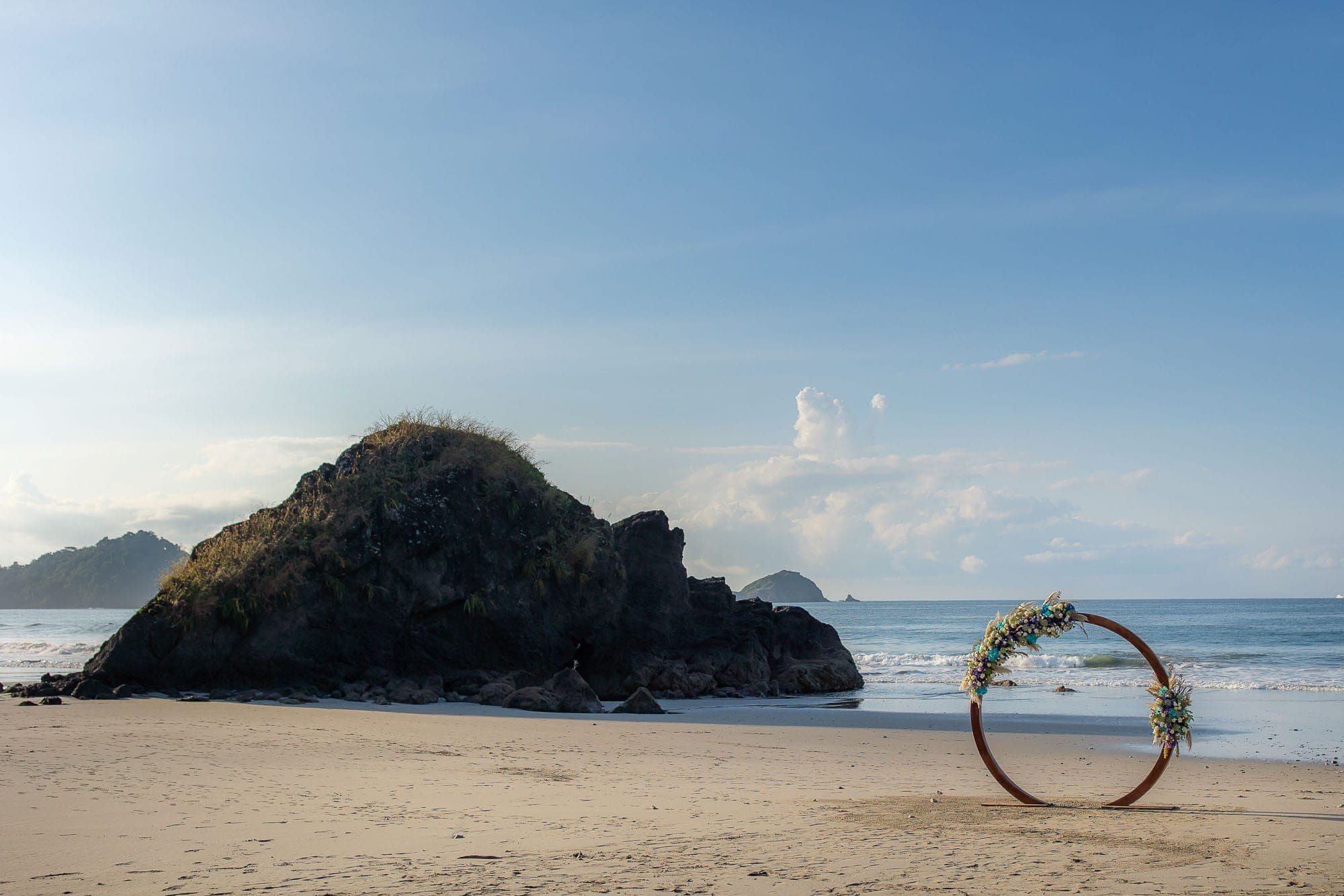 Circular arbor on the beach waiting for the wedding couple