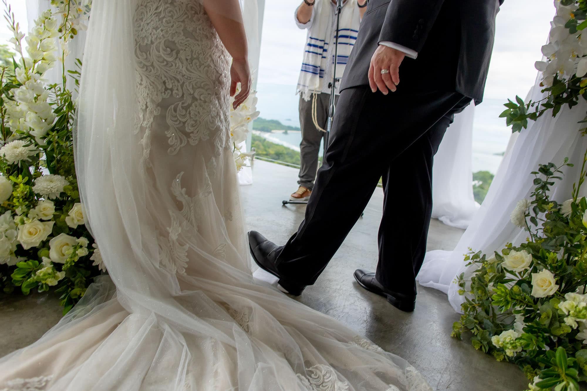 Groom breaks the glass under his foot as a Jewish wedding tradition