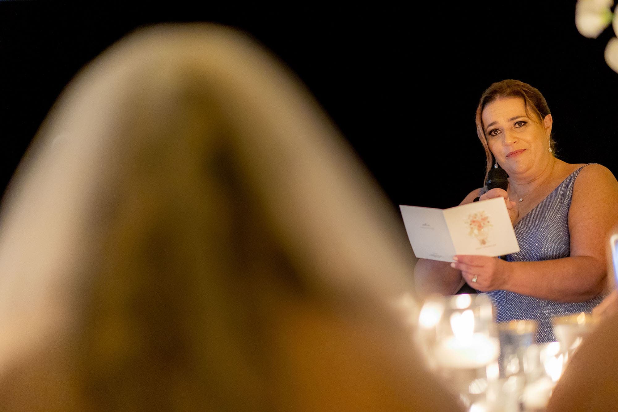 Guest reads a special message for the bride and groom