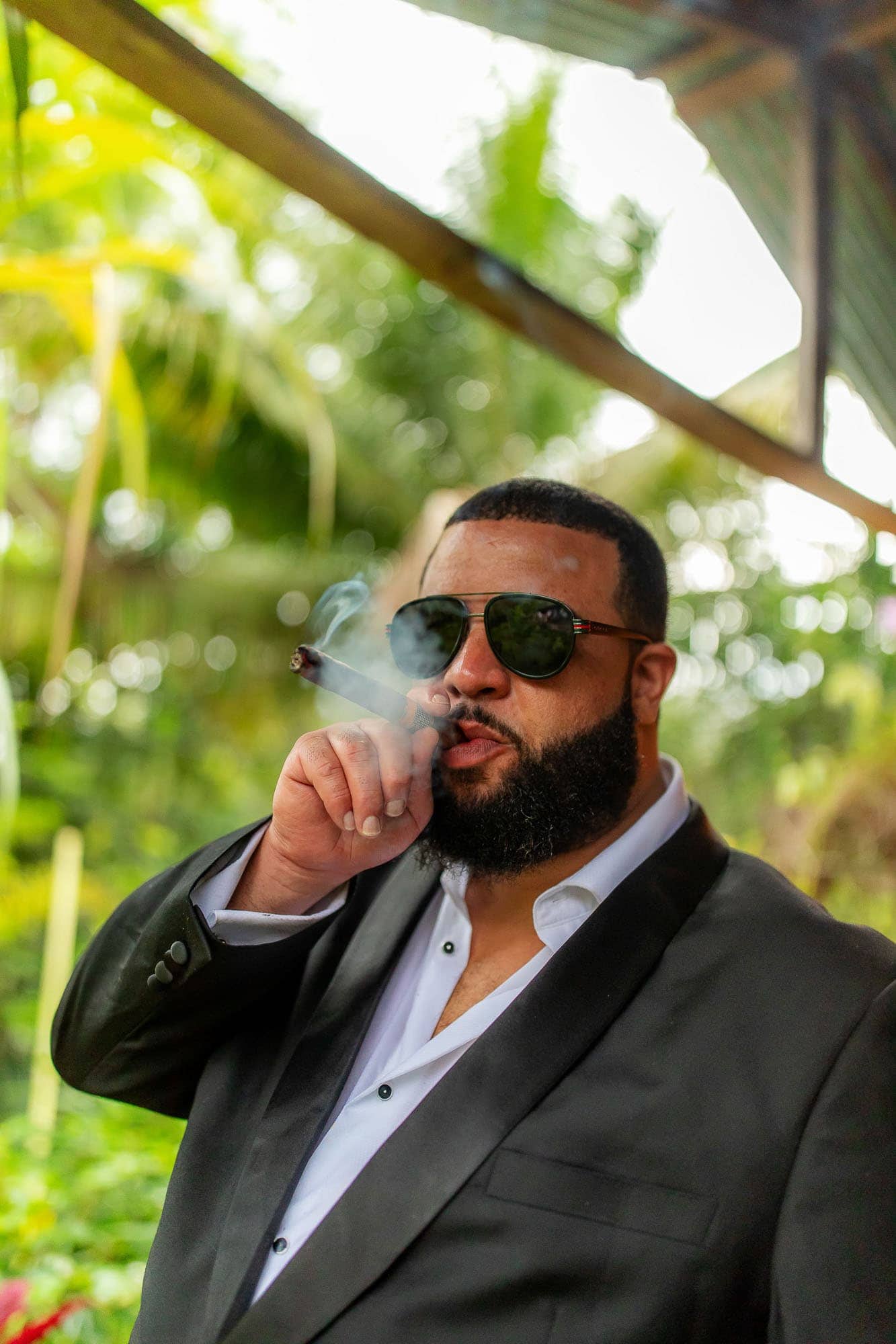 Groom smoking a cigar