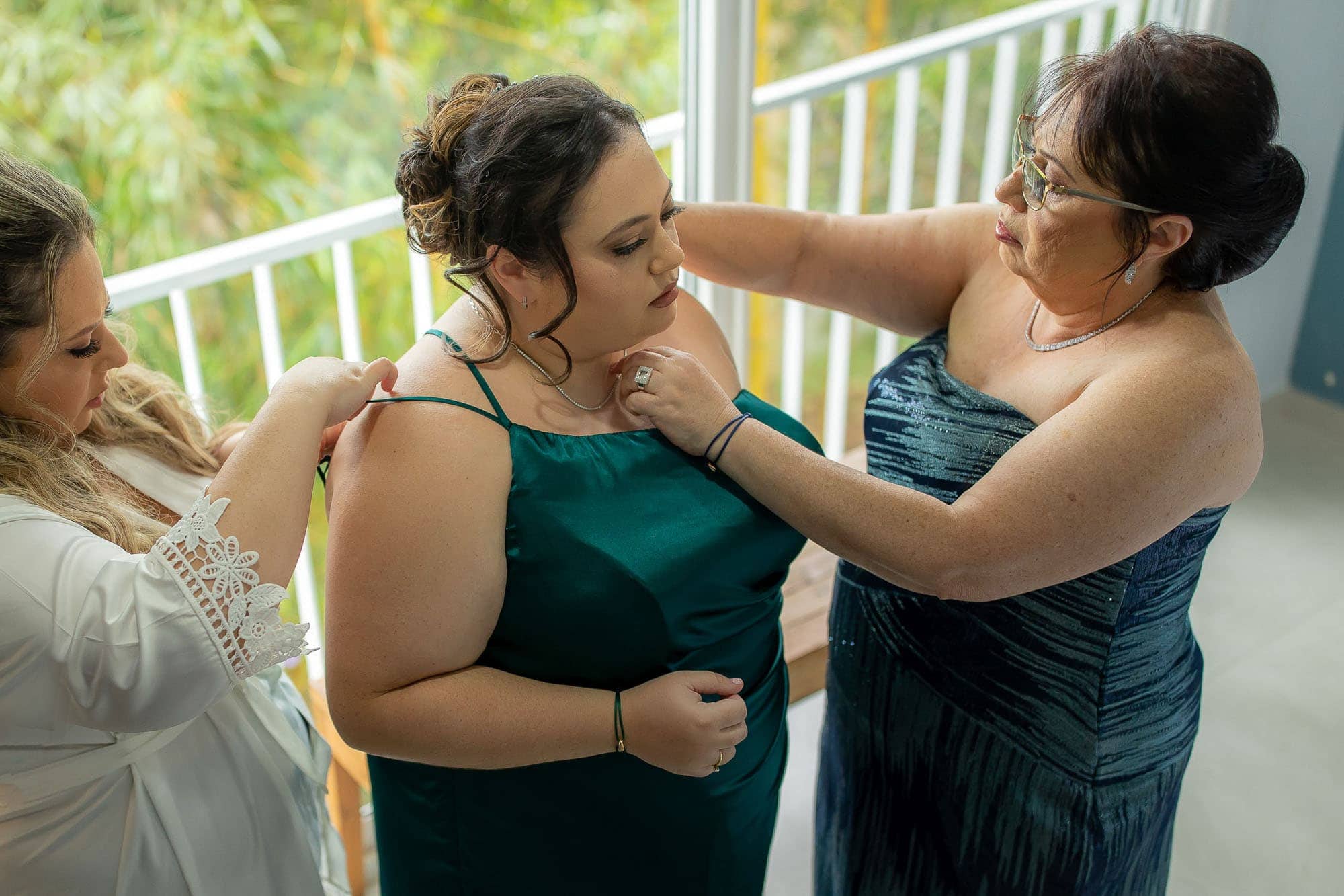 Bride helping to prep a family member