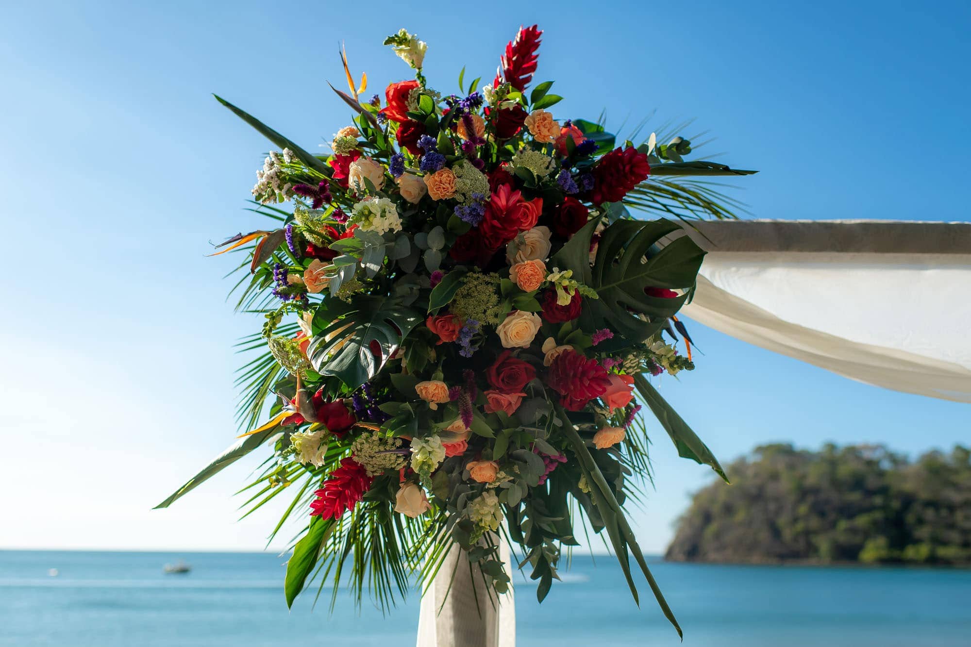 Gorgeous flowers on the arbor done by dreams las mareas weddings