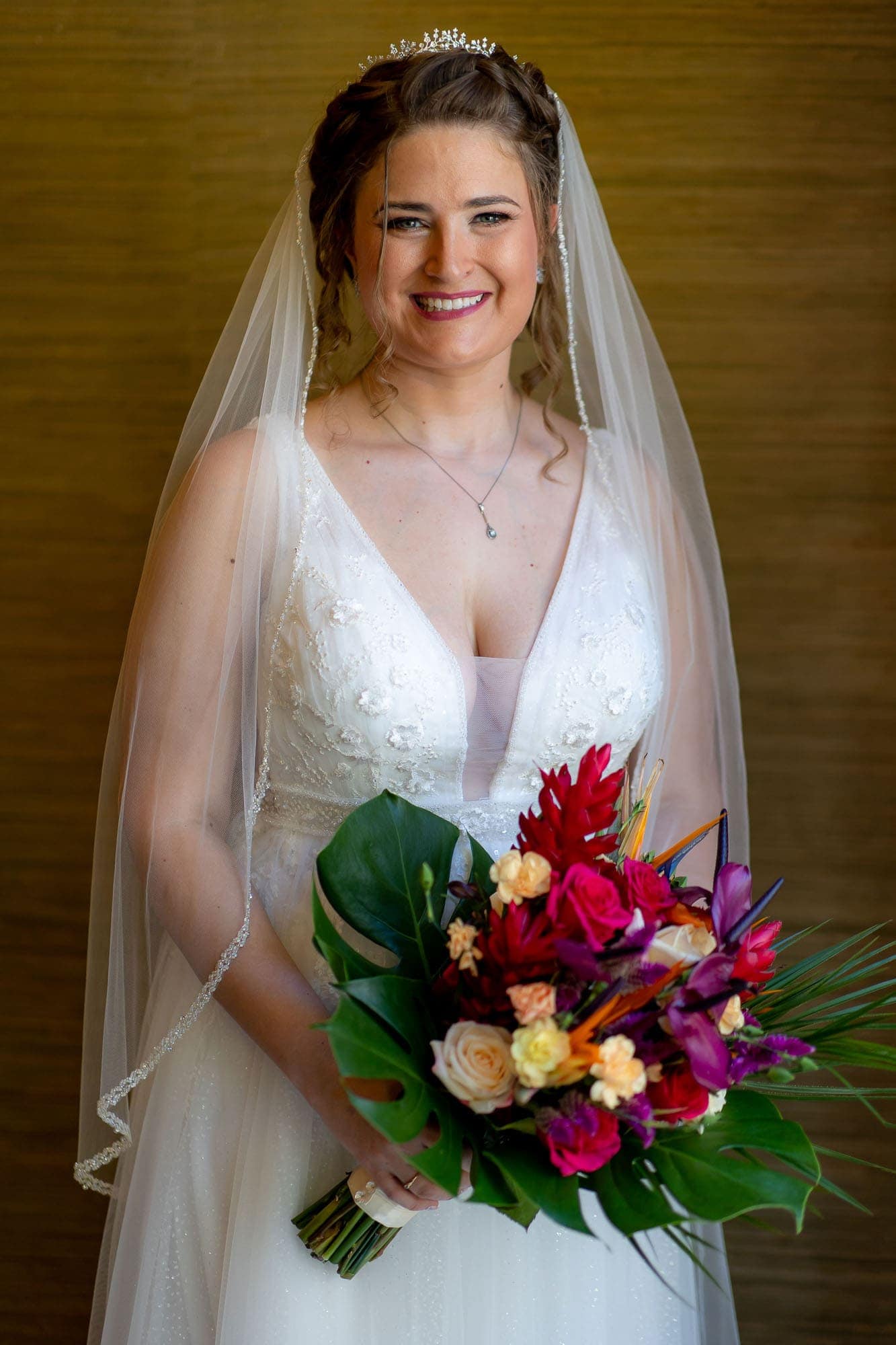 Portrait of the bride with her bouquet at all-inclusive resort dreams las mareas