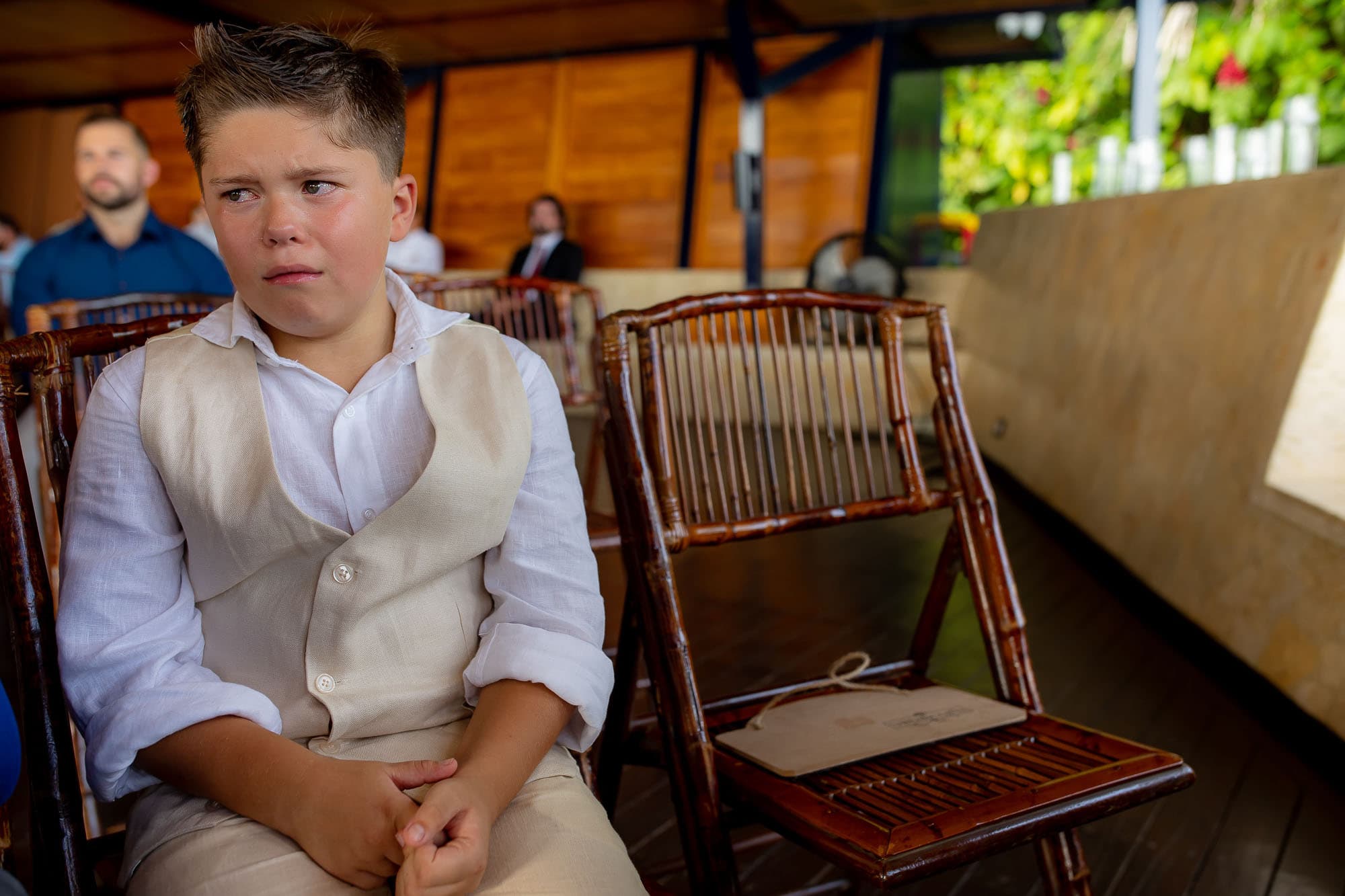 Bride's son tearing up during the ceremony