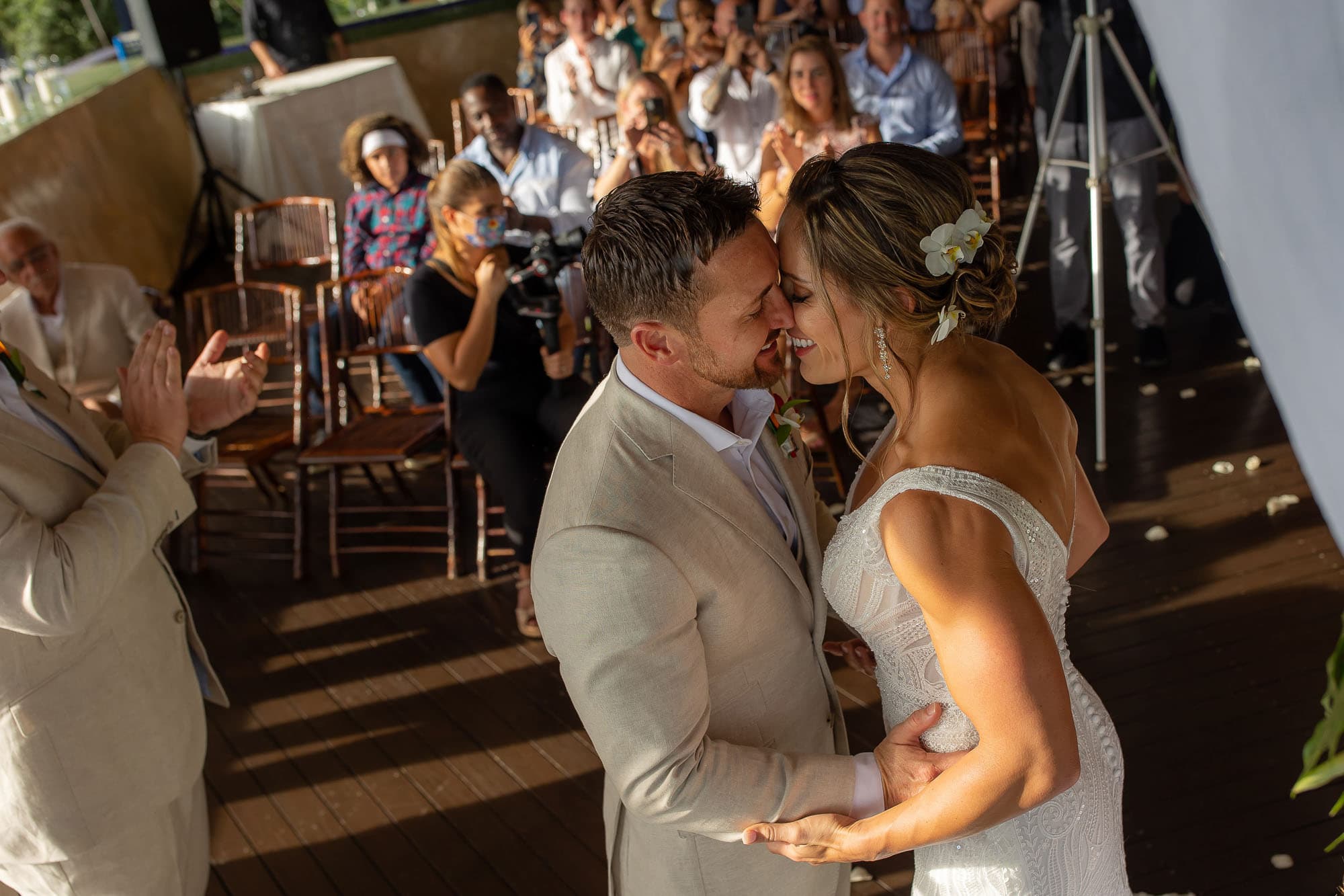 Bride and groom share a kiss at their Costa Rica wedding