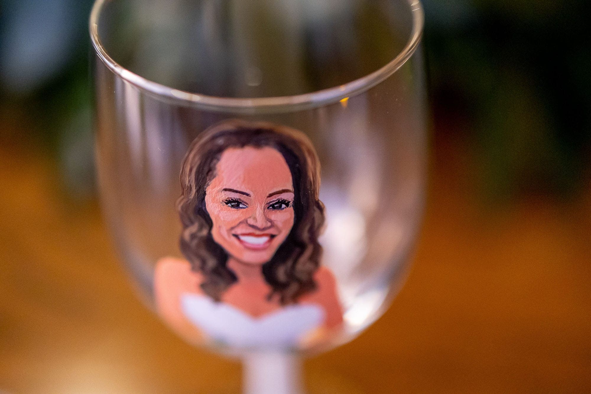 Bride's likeness painted on a glass