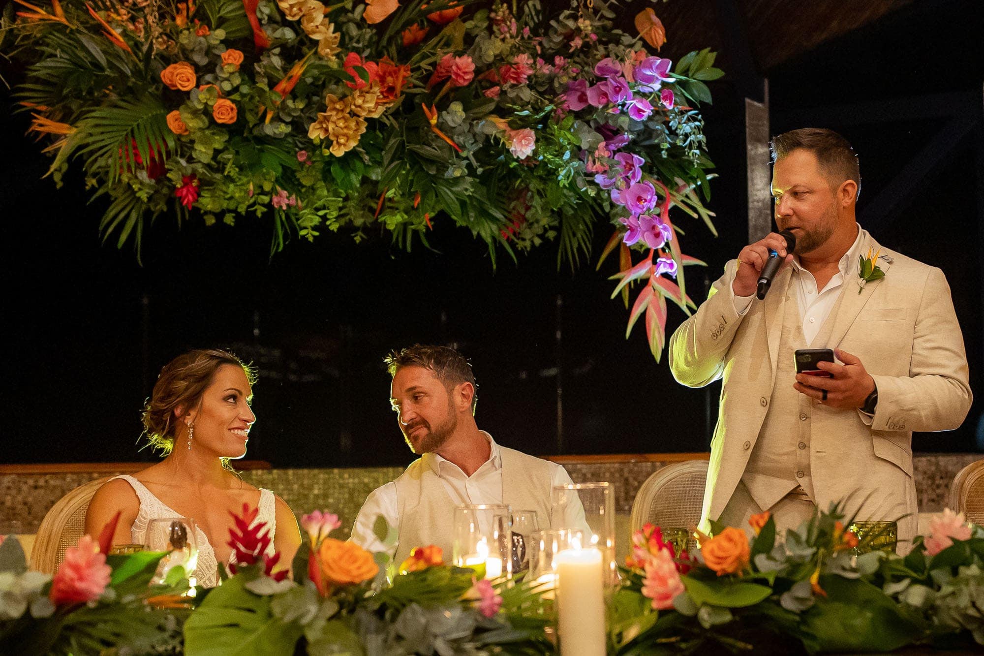 Groomsman toasts the happy couple at a Costa Rica wedding