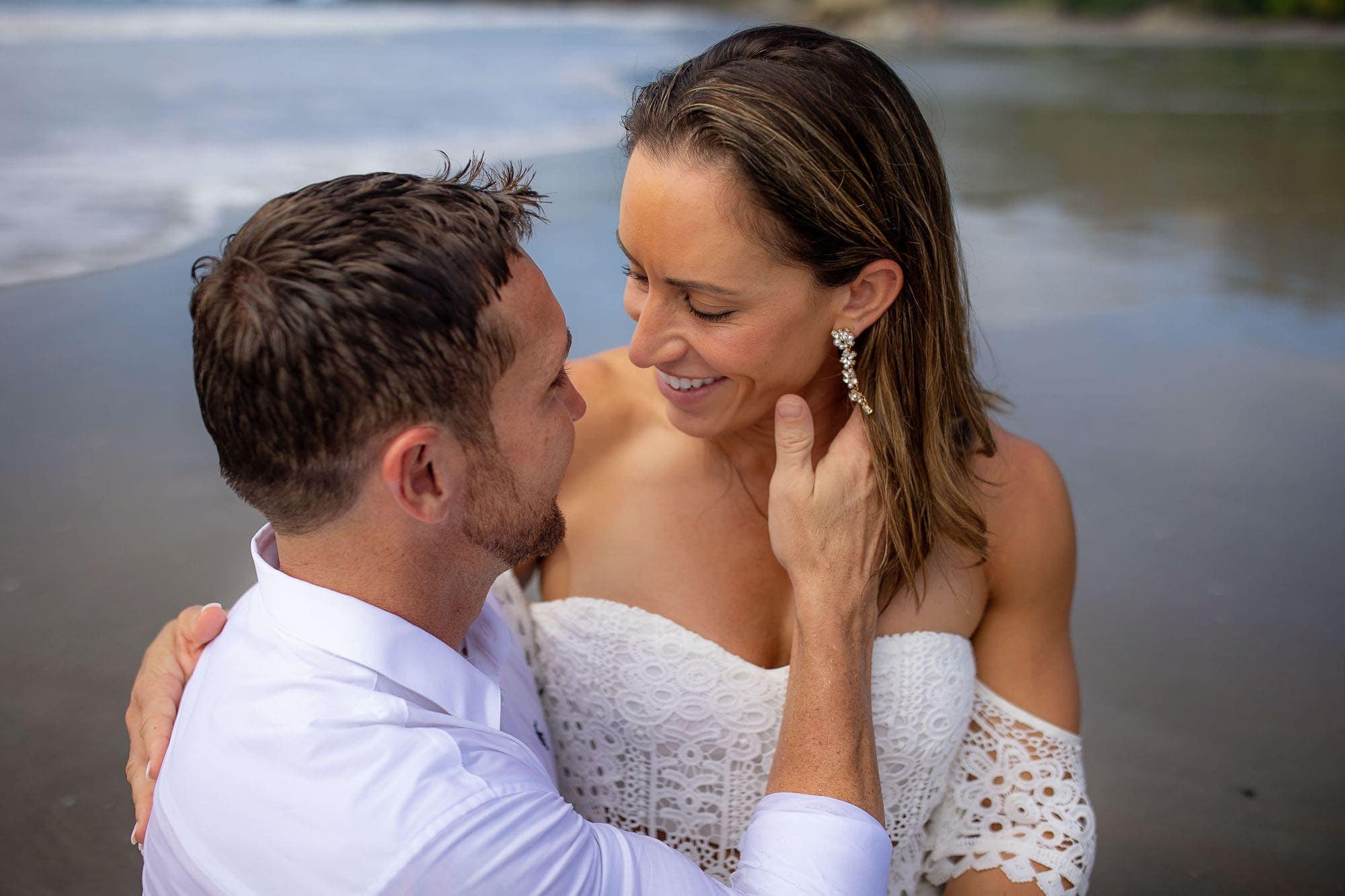 bride and groom on the beach after their Costa Rica wedding
