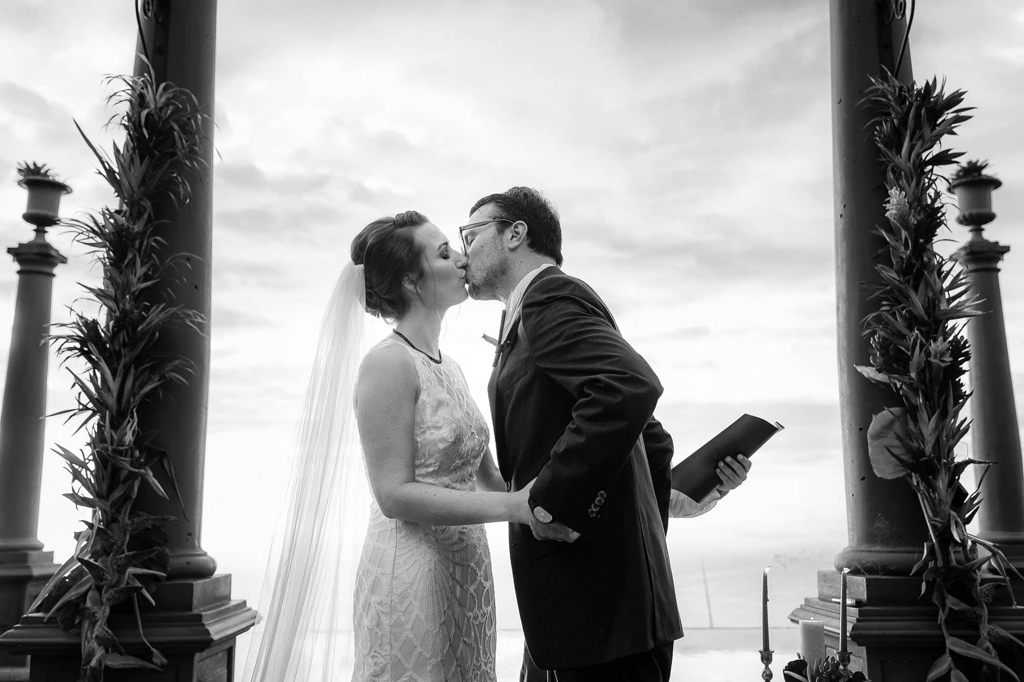 Bride and groom kissing at their luxury destination wedding in Costa Rica