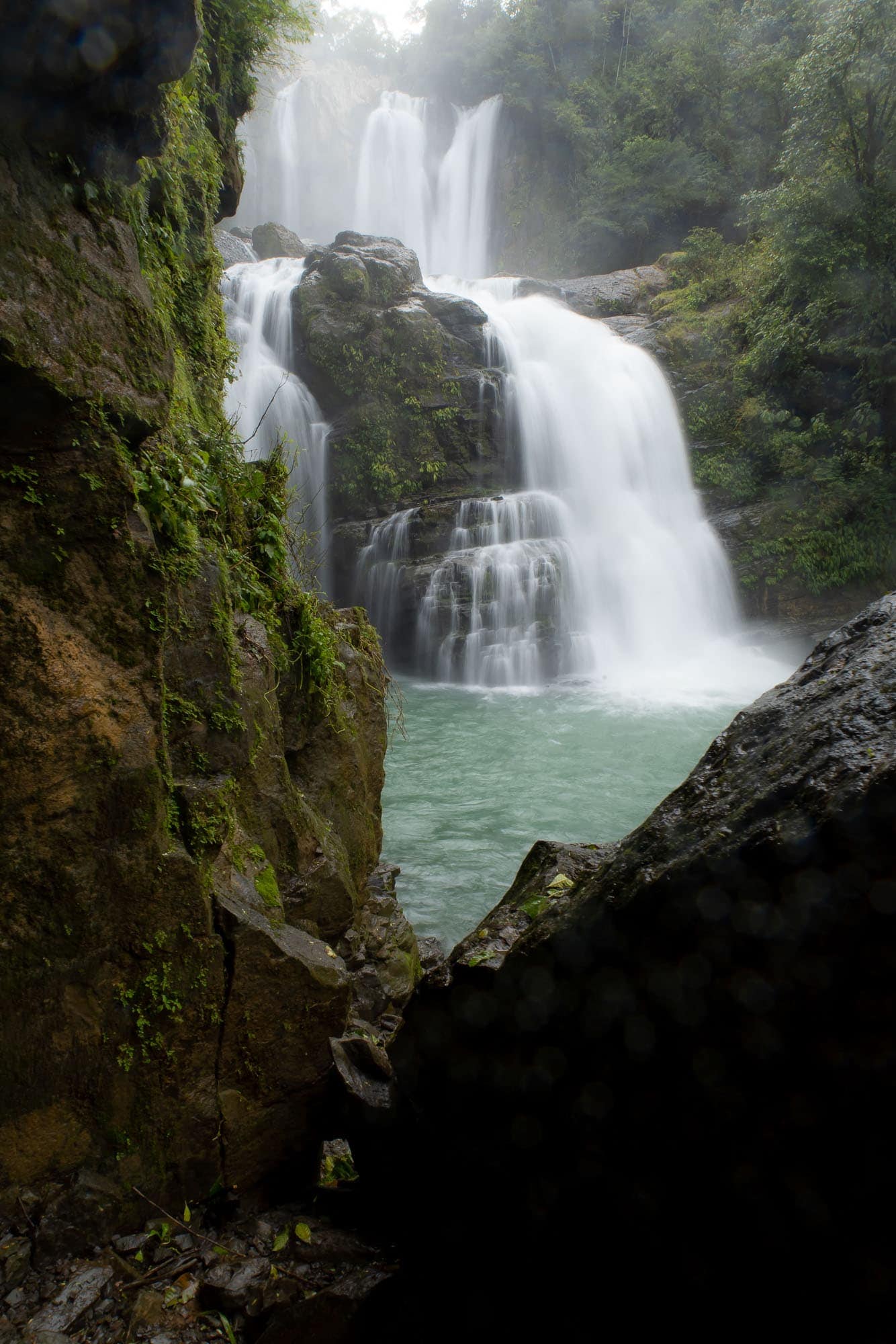 Waterfall between rocks.