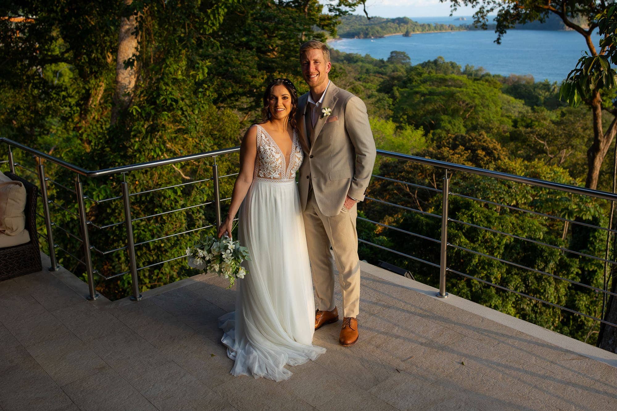 The bride and groom with the view at Vista Hermosa