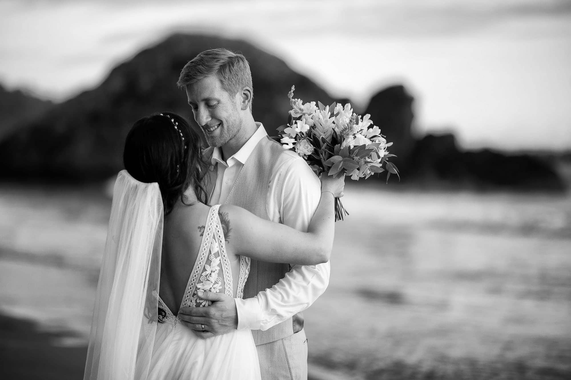 the bride and groom on the beach after their small wedding in Costa Rica