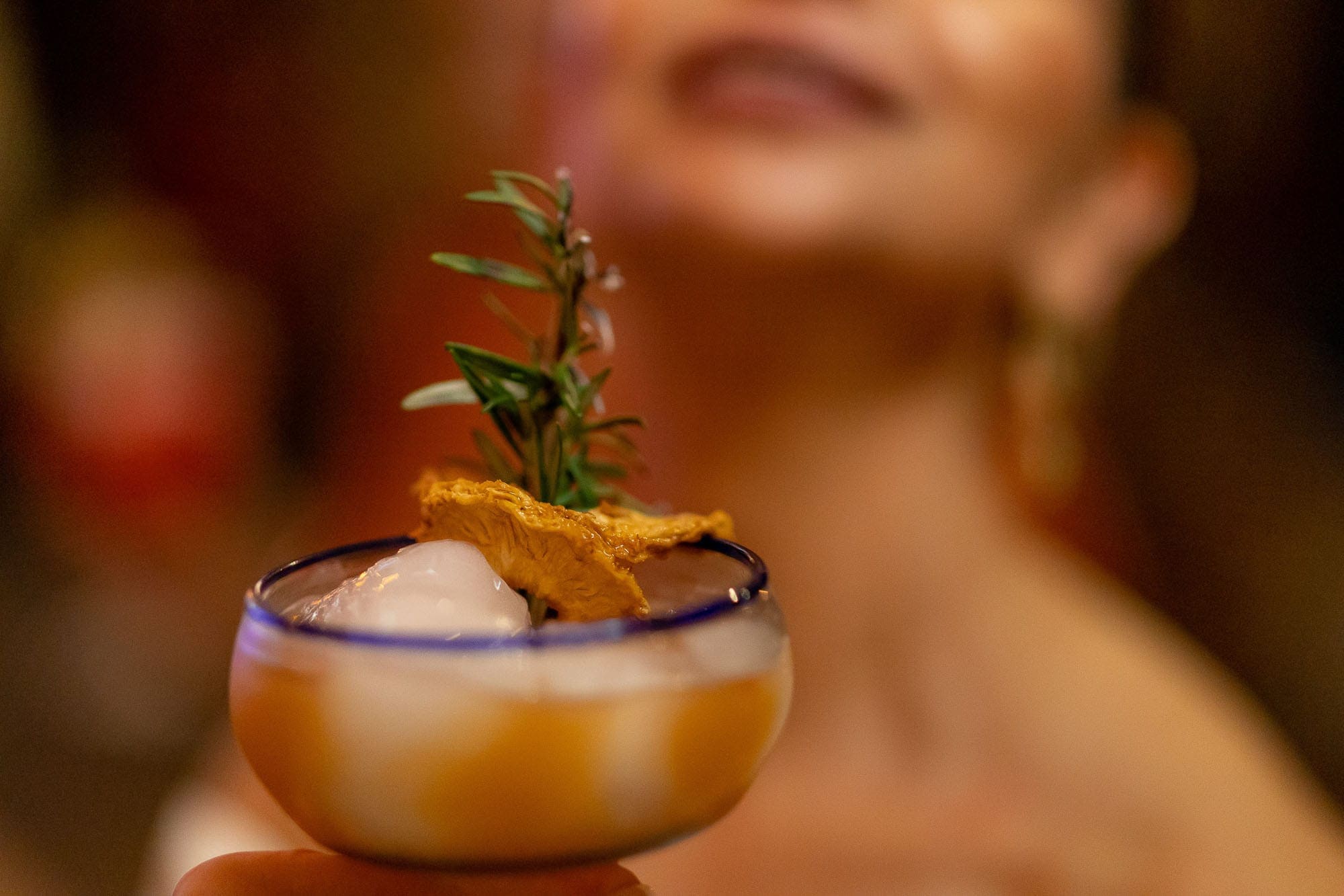 closeup of a delightful pineapple rosemary drink