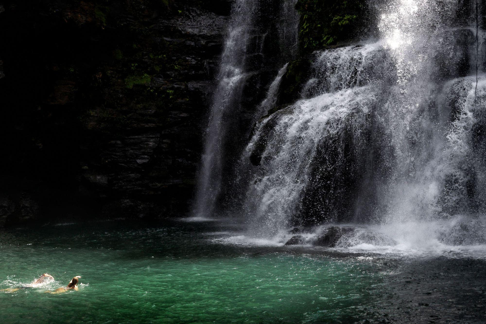 swim at a waterfall costa rica