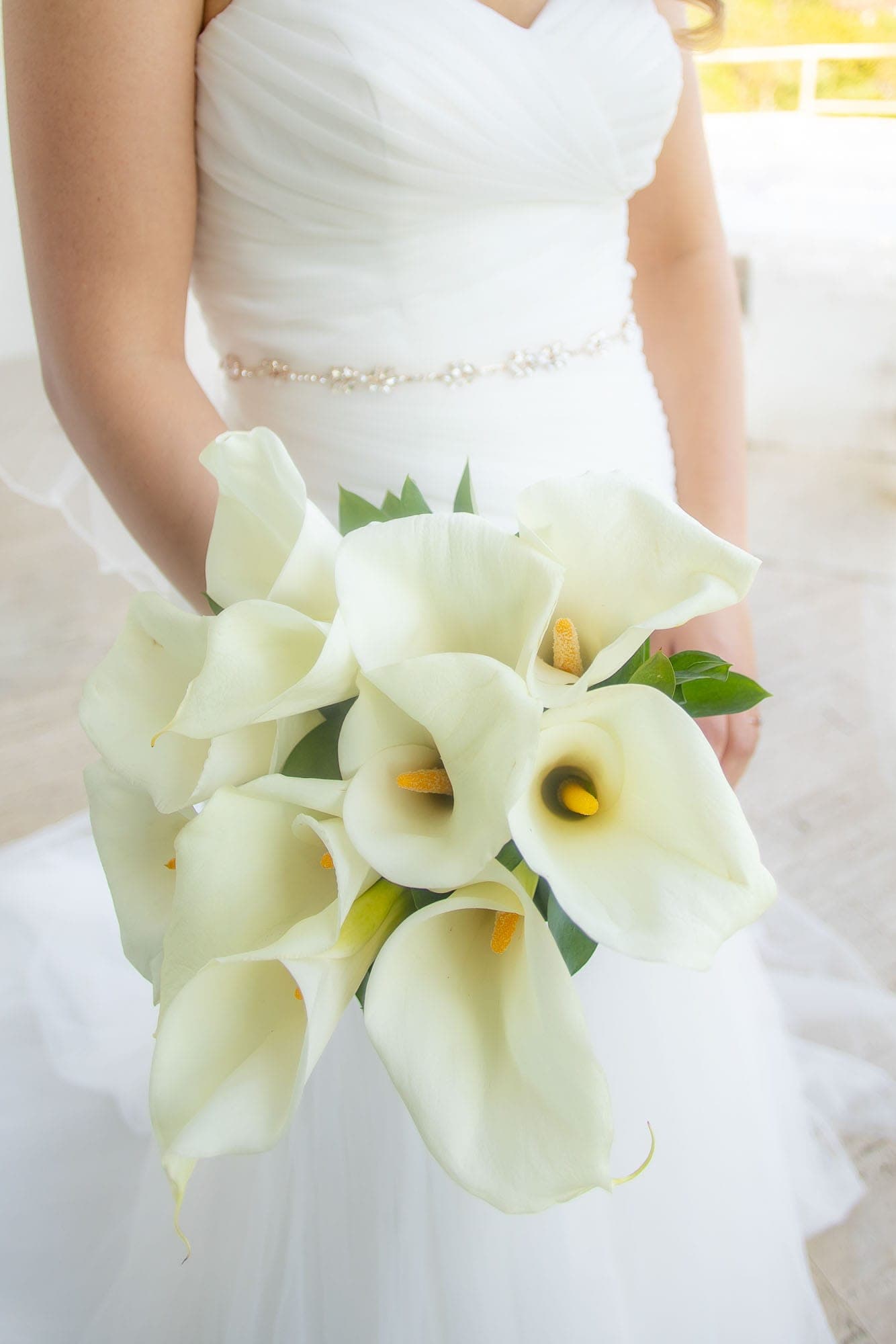 Close up on the calla lily bridal bouquet