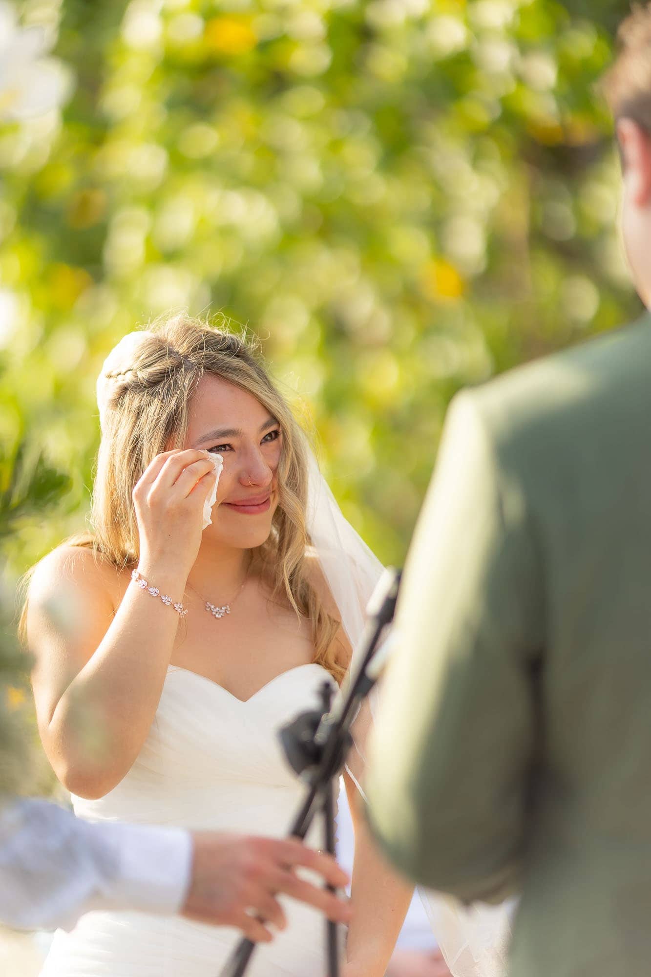 Bride crying at her wedding ceremony