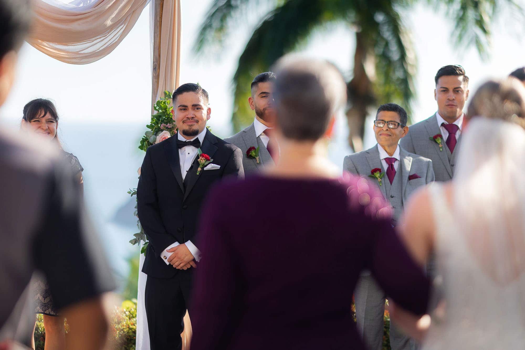 groom sees his bride during the ceremony