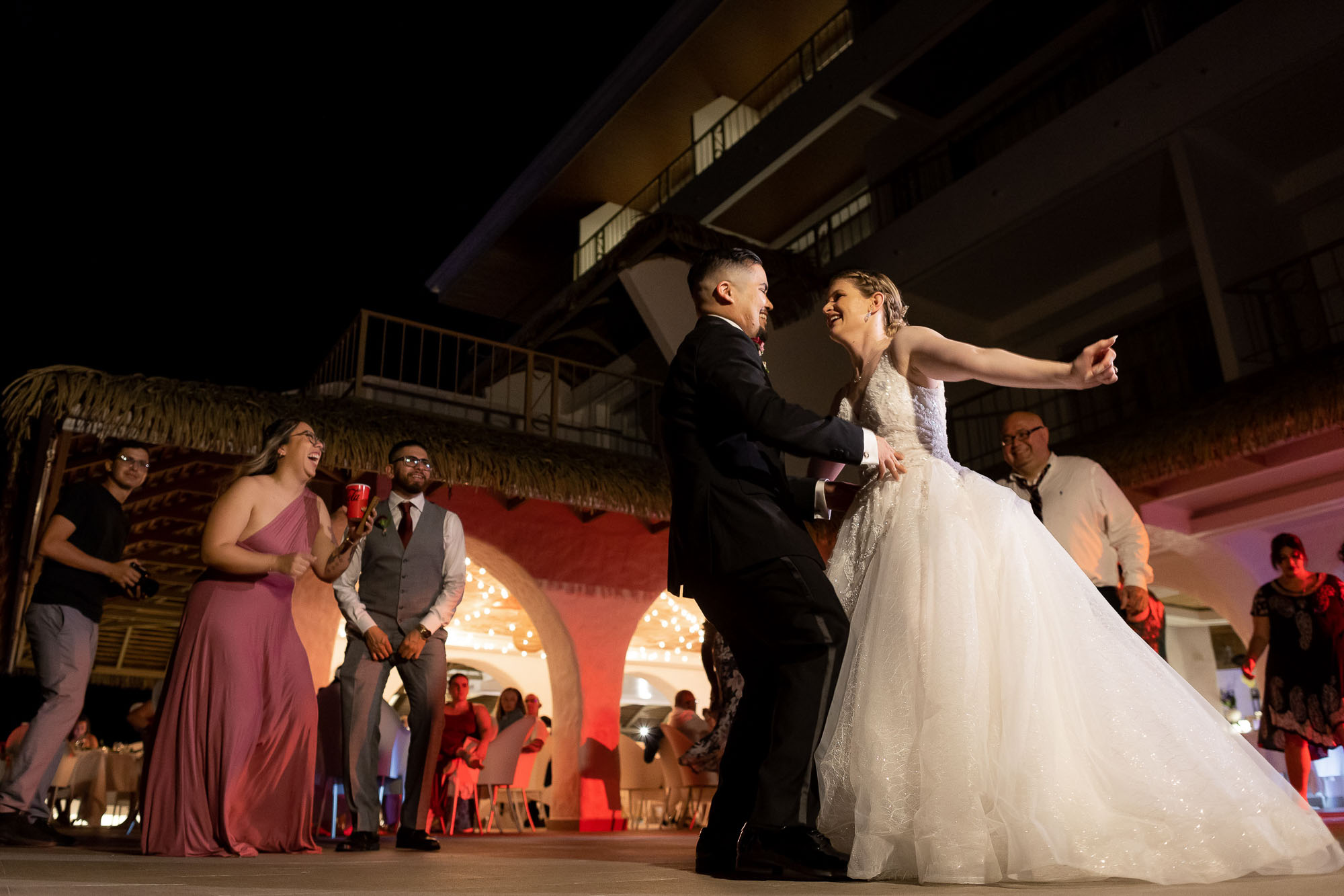 bride and groom dancing at le papillon restaurant