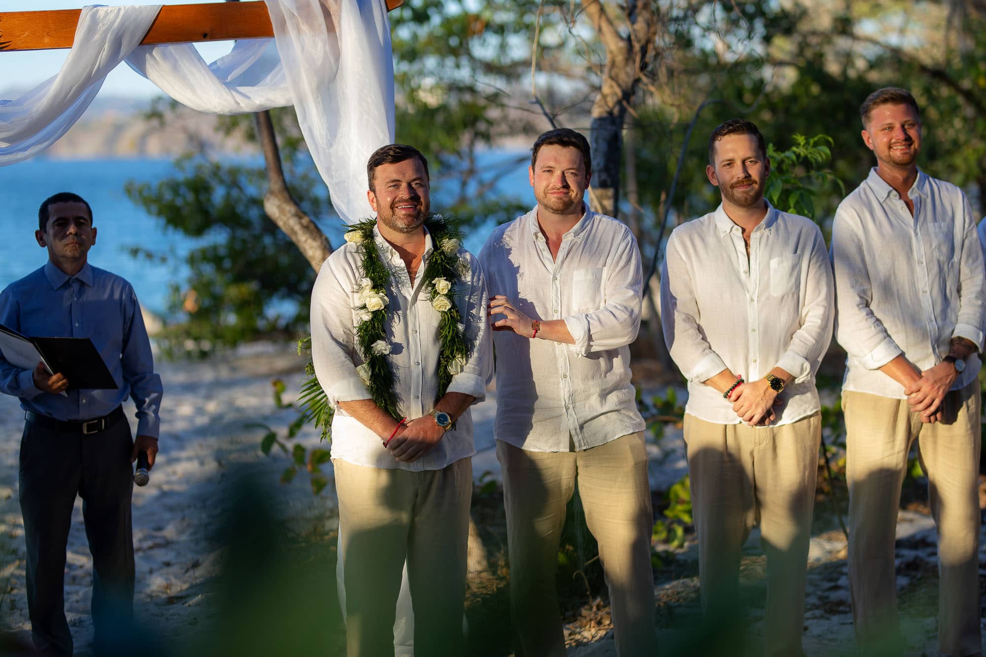groom seeing his bride for the first time at beach wedding