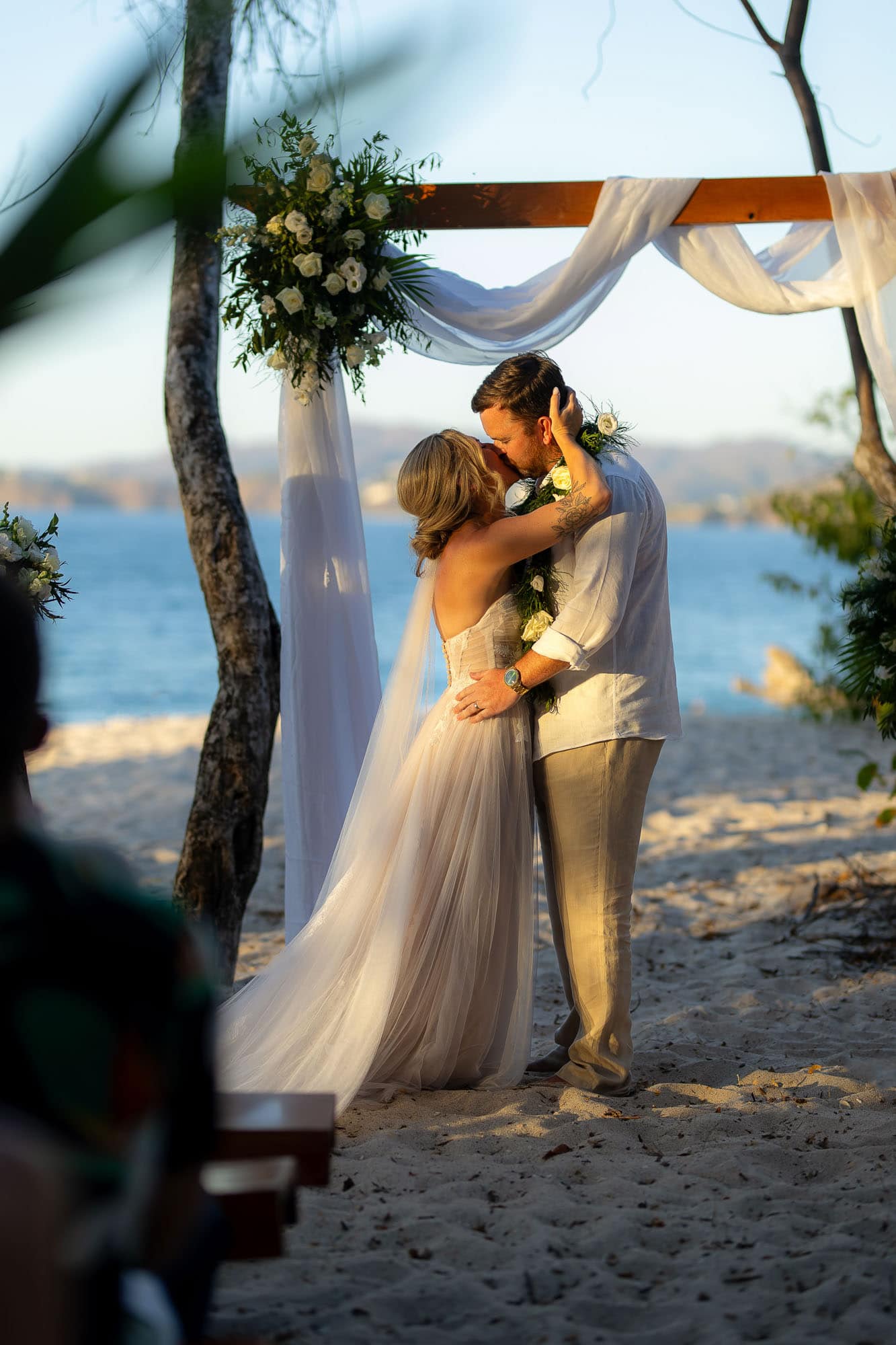 first kiss at beach wedding at w hotel - reserva conchal