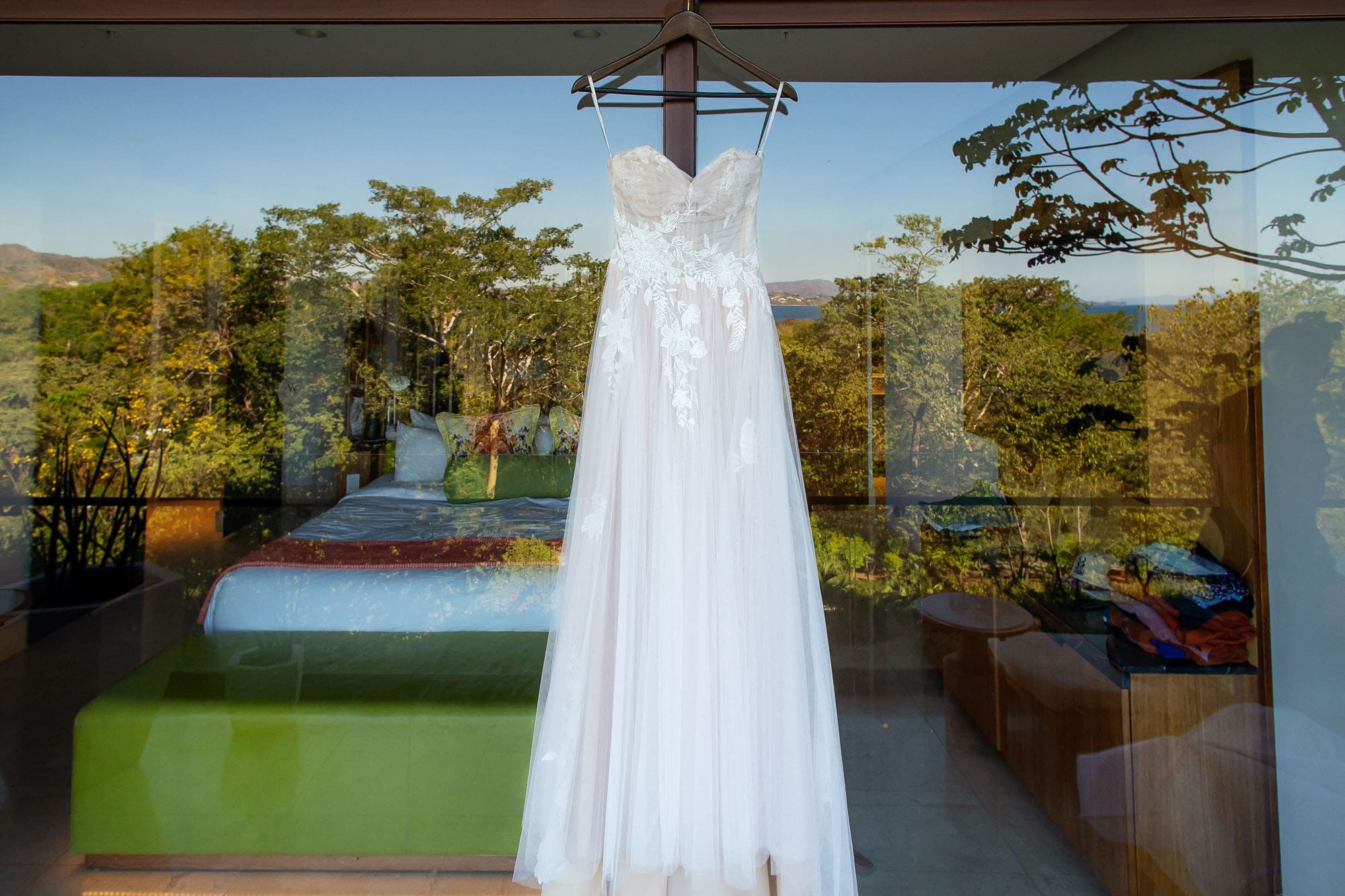 wedding dress at hotel w costa rica - reserva conchal showing off the view of the hotel