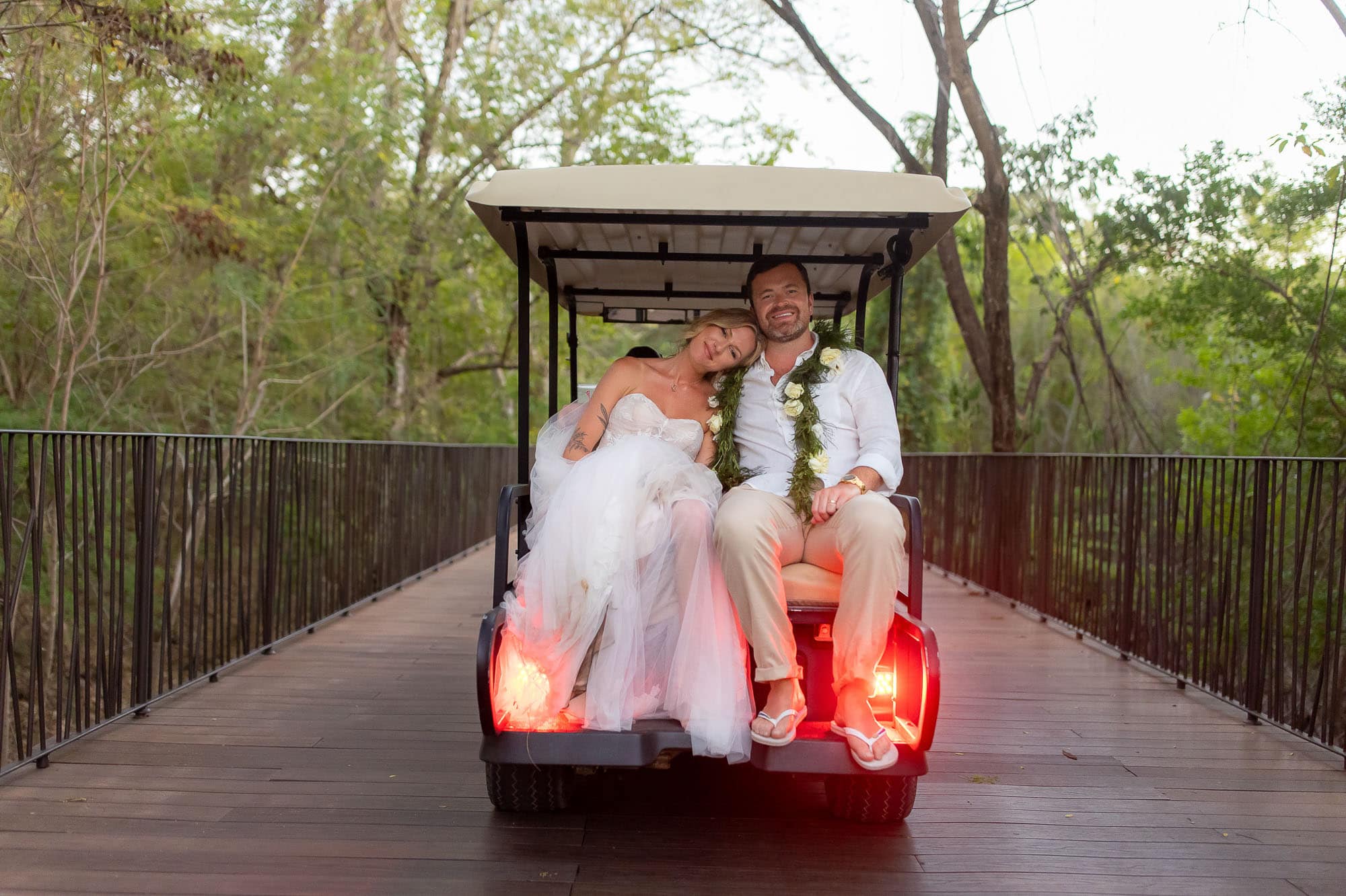Bride and groom on golf cart at W Costa Rica - Reserva Conchal